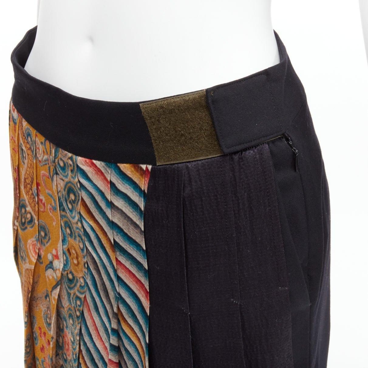 DRIES VAN NOTEN 2012 Runway  Yellow chinese dragon pleated kilt trousers FR36 S
Reference: TGAS/D00473
Brand: Dries Van Noten
Collection: 2012 Fall - Runway
Material: Wool, Silk
Color: Black, Yellow
Pattern: Ethnic
Closure: Magic Tape
Extra Details:
