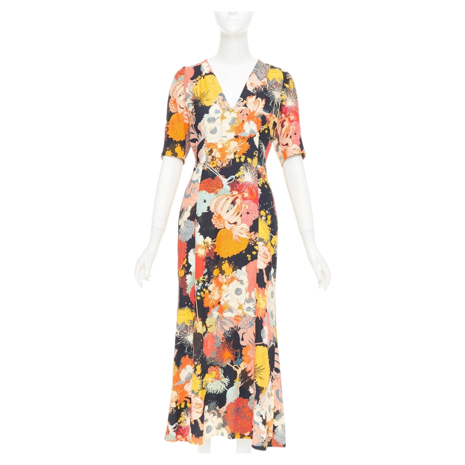 Dries van Noten 2017: vestido midi de pasarela en tonos naranja, amarillo y negro con estampado floral y cuello en V, talla FR36 S