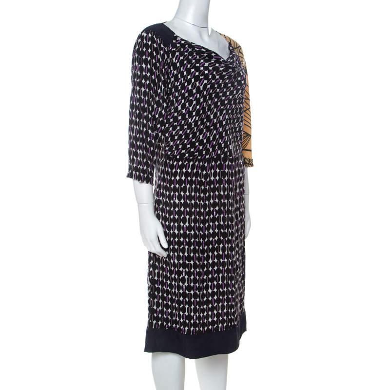 In a world full of high fashion brands  this Dries Van Noten dress surely stands out. Style this multicolored piece with dainty accessories for a unique and attractive look. Tailored from quality silk  this outfit makes a statement of its own.