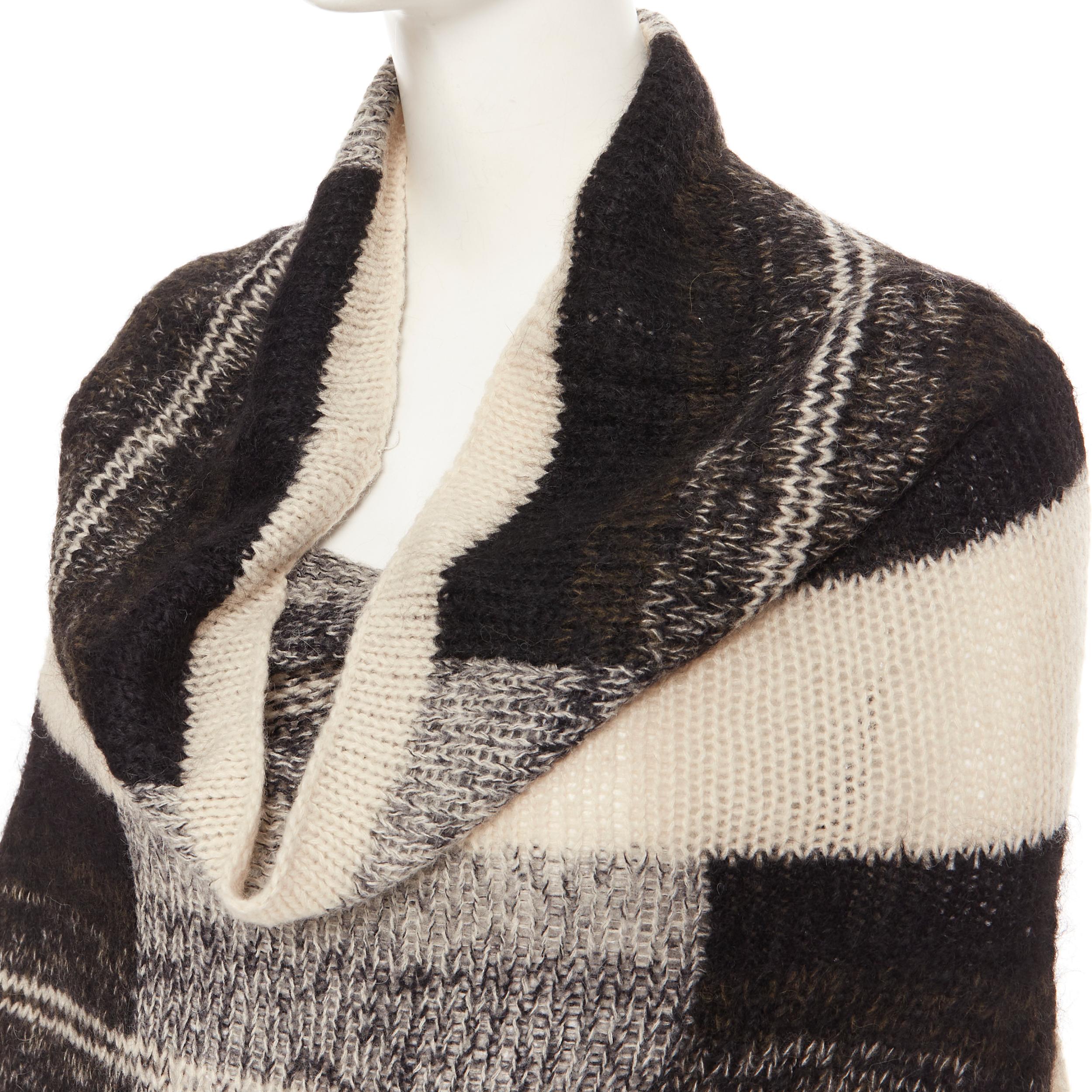 DRIES VAN NOTEN alpaca wool beige black check knit cowl neck sweater dress S 
Reference: CAWG/A00196 
Brand: Dries Van Noten 
Designer: Dries Van Noten 
Material: Alpaca 
Color: Beige 
Pattern: Check 
Extra Detail: Alpaca wool blend. Beige check.