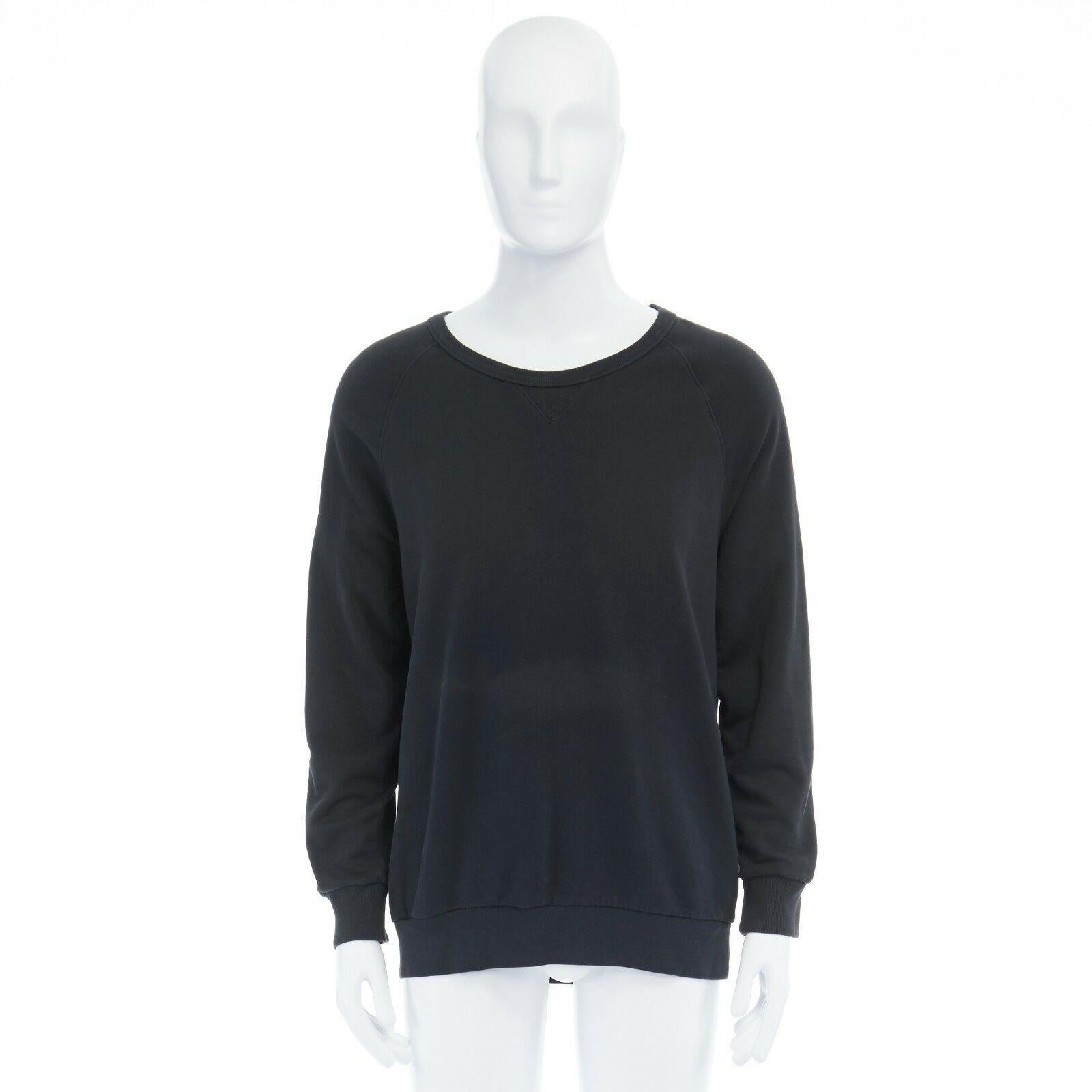 DRIES VAN NOTEN  black cotton zip back quilted lining sweater pullover top L

DRIES VAN NOTEN
Cotton, polyester, silk. Black. Crew neck. Long sleeve. Silver-tone zip back detail. Purple quilted fabric lining. Oversized fit. Made in