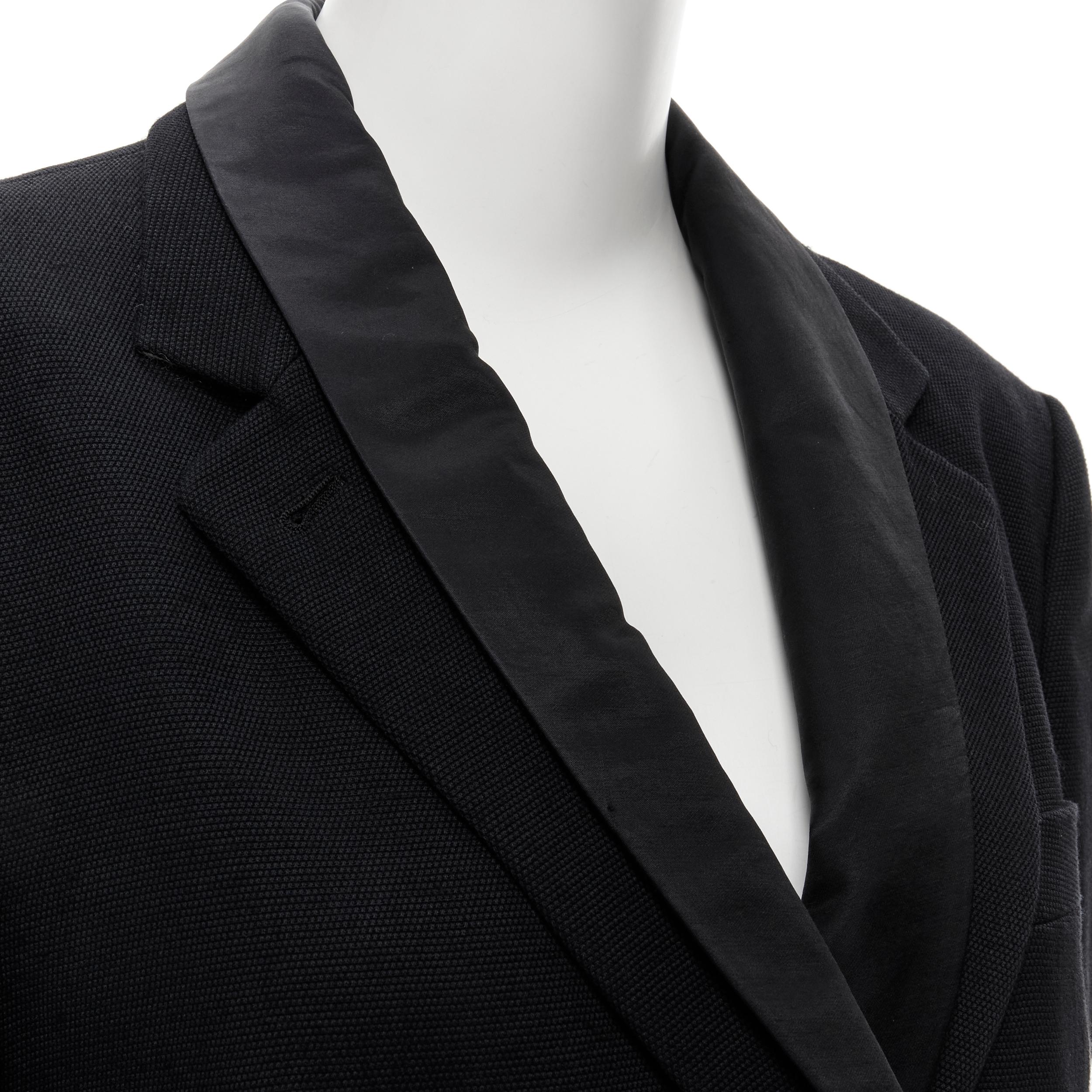 DRIES VAN NOTEN black double notched shawl collar blazer jacket FR38 S 
Reference: CLYG/A00047 
Brand: Dries Van Noten 
Designer: Dries Van Noten 
Material: Wool 
Color: Black 
Pattern: Solid 
Closure: Button 
Extra Detail: Double collar - satin