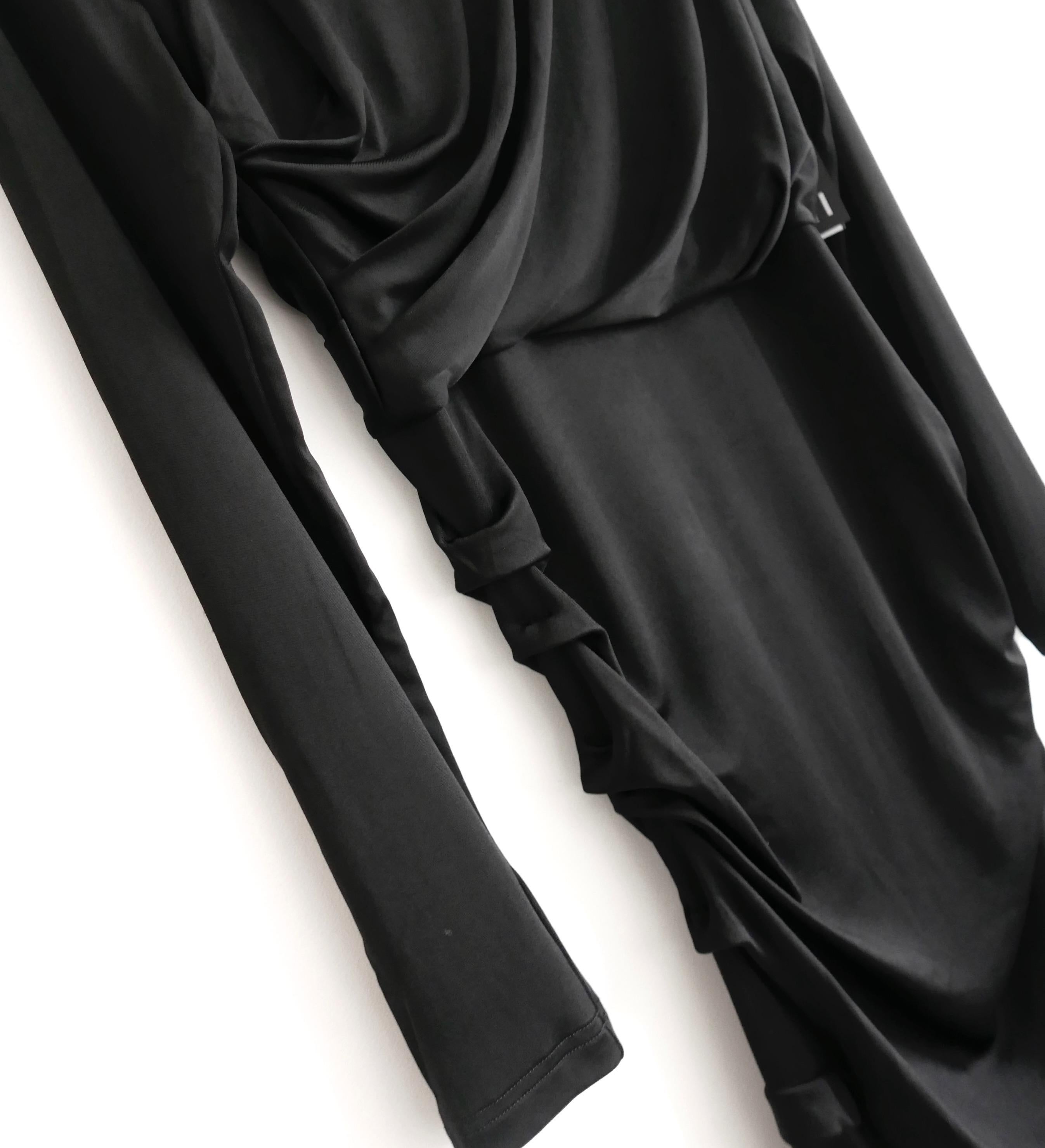 Slinky and timeless Dries Van Noten draped jersey dress. Bought for £795 and new with tags. Made from the softest, most fluid stretchy black viscose and elastane. The cut is the epitome of easy elegance with superbly placed soft draping, long