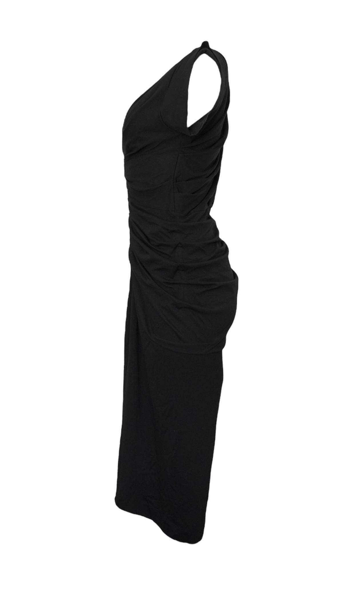 Dries Van Noten Black Ruched Midi Deep V Dress.
Front Center Zip
Beautiful pleating and draping throughout
Shoulder details
Double-lined throughout the chest
Size Medium
Length: 49 inches
Bust: 34 inches
Waist: 30 inches
100% cotton
Made in Turkey