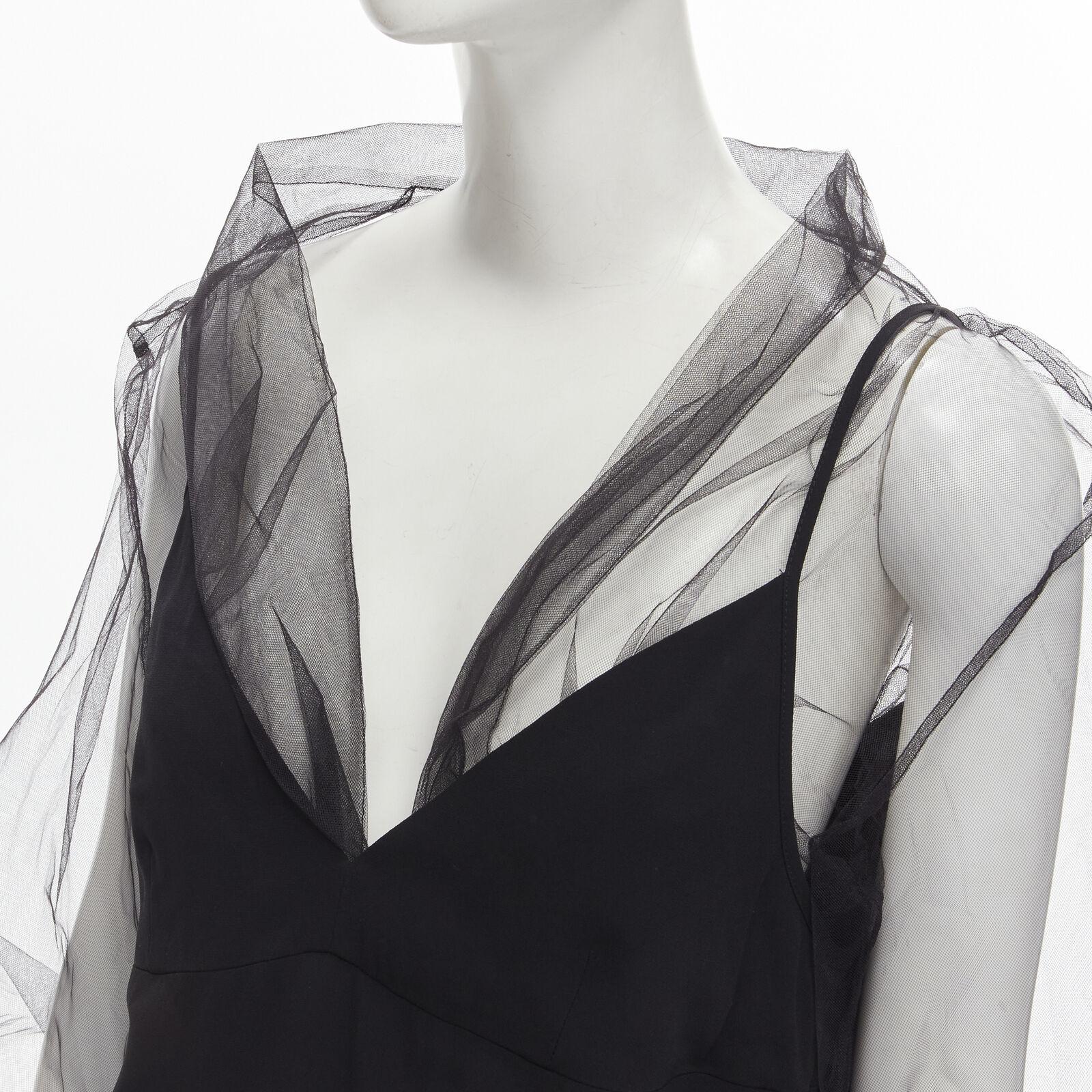 DRIES VAN NOTEN black oversized sheer organza layered camisole top FR38 M
Reference: KEDG/A00230
Brand: Dries Van Noten
Material: Polyester, Viscose
Color: Black
Pattern: Solid
Extra Details: Designed to look like a slip camisole top is worn over an