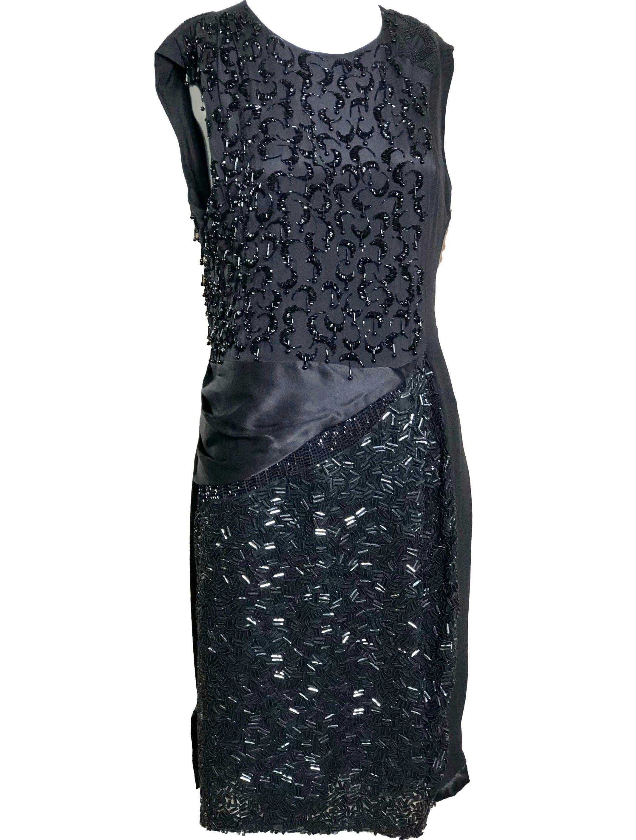 Early 2000s Dries Van Noten Evening dress. Black silk  satin and chiffon with a patchwork of different and interesting beadwork - from seed beads to bugle beads. Simple silhouette with complex construction and decoration. Fully lined and with a nice