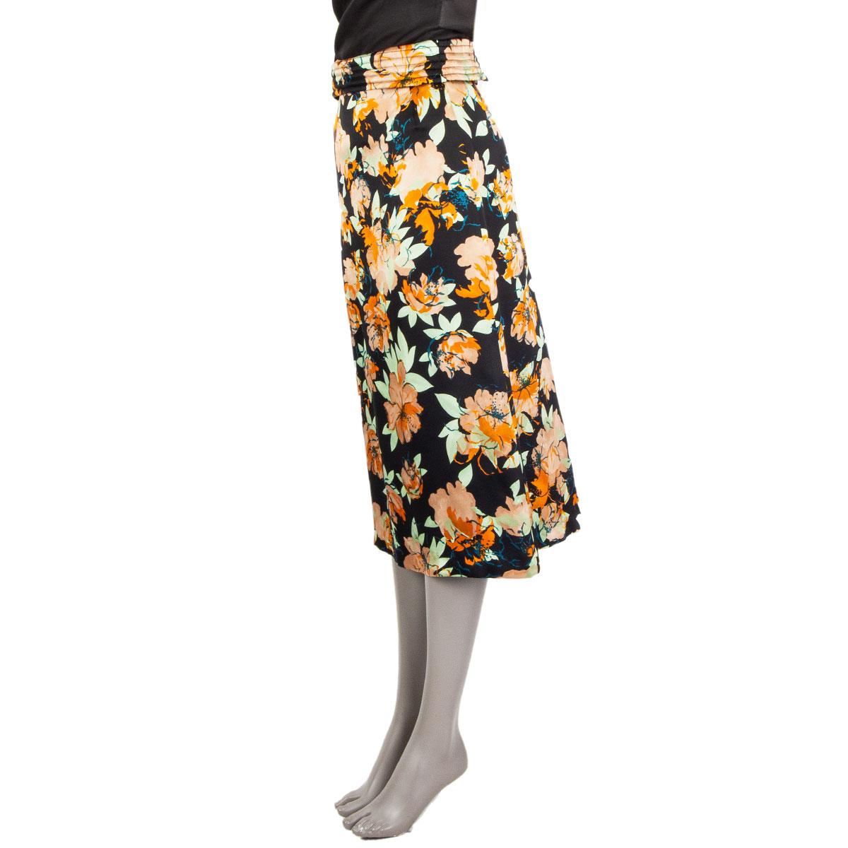 authentic Dries Van Noten floral print skirt in black, pantone, sage and nude silk (100%) with a stitched high waist, and a flared A-line. Lined in black silk (100%). Closes with a hook & bar and a concealed zipper in the back. Has been worn an is