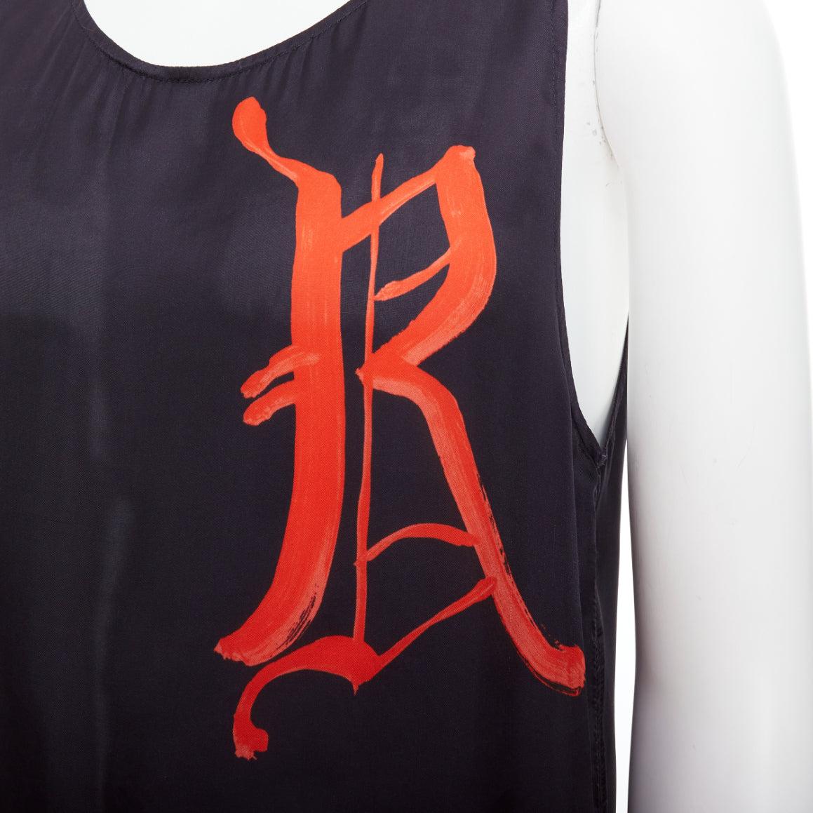 DRIES VAN NOTEN black viscose gothic R print viscose tank top IT46 S
Reference: PRCG/A00008
Brand: Dries Van Noten
Material: Viscose
Color: Black, Red
Pattern: Solid
Closure: Pullover
Made in: Hungary

CONDITION:
Condition: Very good, this item was