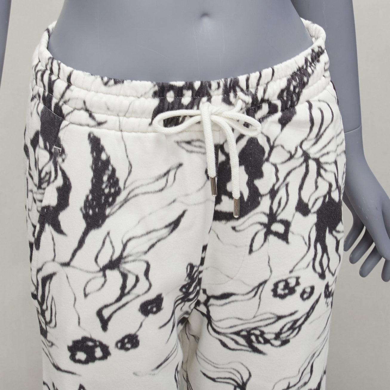 DRIES VAN NOTEN black white cotton blurry abstract floral print sweatpants S
Reference: DYTG/A00068
Brand: Dries Van Noten
Material: Cotton
Color: White, Black
Pattern: Floral
Closure: Drawstring
Made in: Turkey

CONDITION:
Condition: Very good,