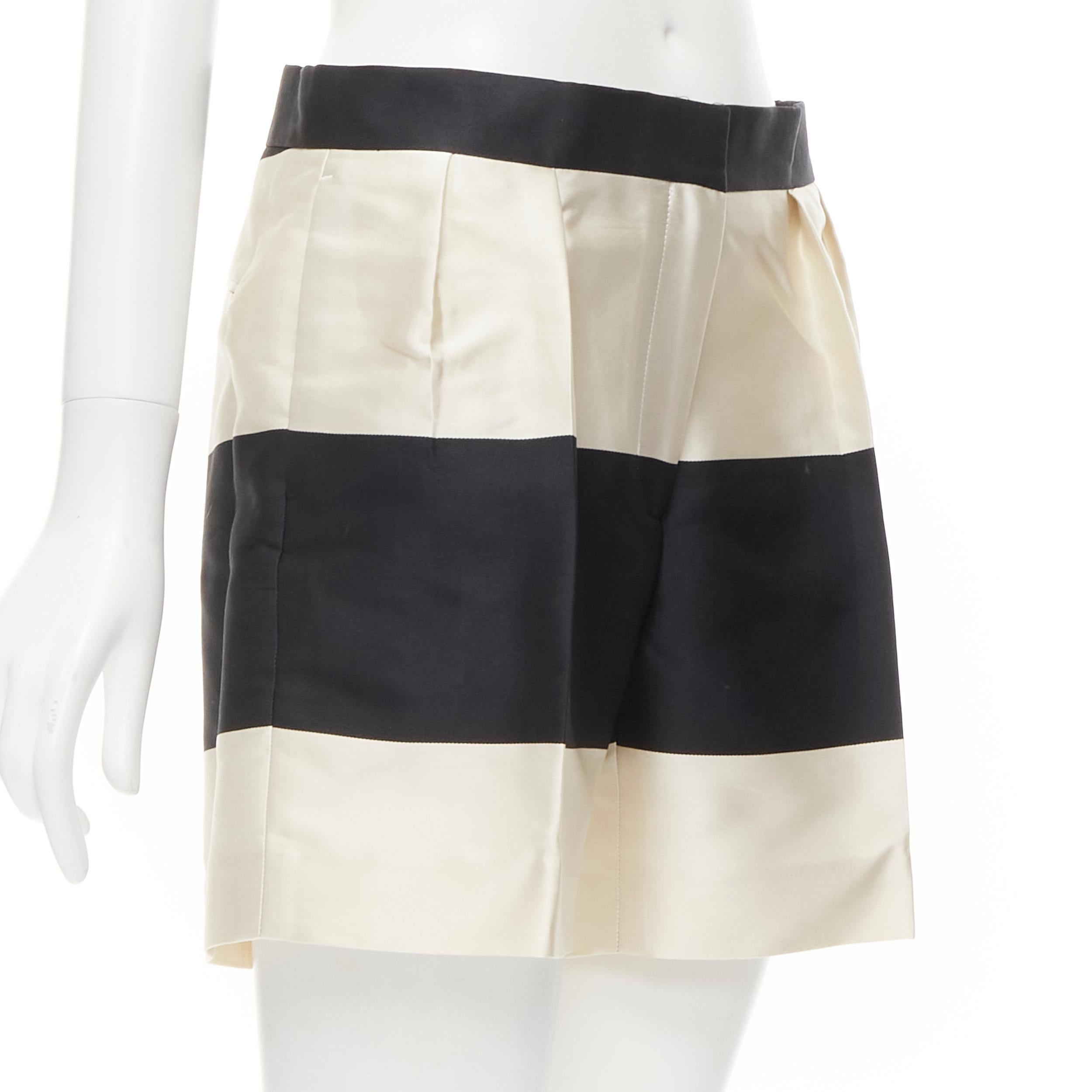 DRIES VAN NOTEN black white polyester silk striped pleat front shorts FR36 S 
Reference: MELK/A00034 
Brand: Dries Van Noten 
Material: Polyester 
Color: Black 
Pattern: Striped 
Closure: Zip 
Extra Detail: 3-pocket design. 
Made in: Morocco