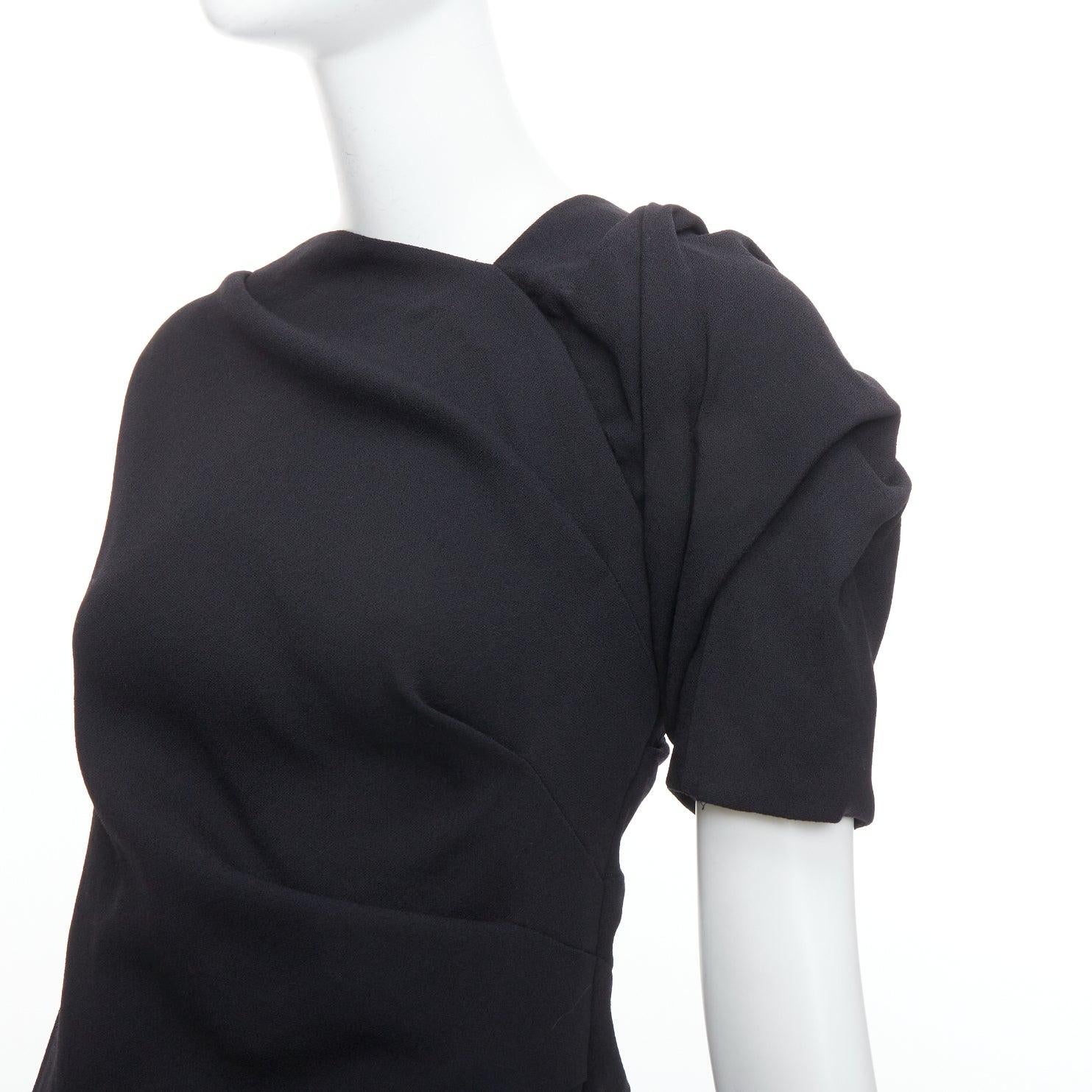 DRIES VAN NOTEN black wool blend asymmetric sleeve drape dress FR36 S
Reference: MECG/A00038
Brand: Dries Van Noten
Material: Wool, Blend
Color: Black
Pattern: Solid
Closure: Zip
Lining: Black Fabric
Extra Details: Side zip.
Made in: