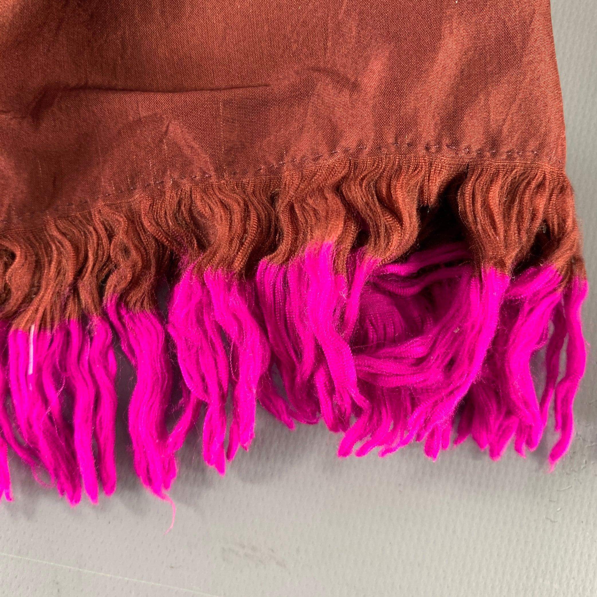 DRIES VAN NOTEN scarf in a brown silk featuring fuchsia dip dyed fringe ends. Very Good Pre-Owned Condition. Minor signs of wear on fringe. 

Measurements: 
  51 inches  x 10 inches 

  
  
 
Sui Generis Reference: 132399
Category: Scarves
More