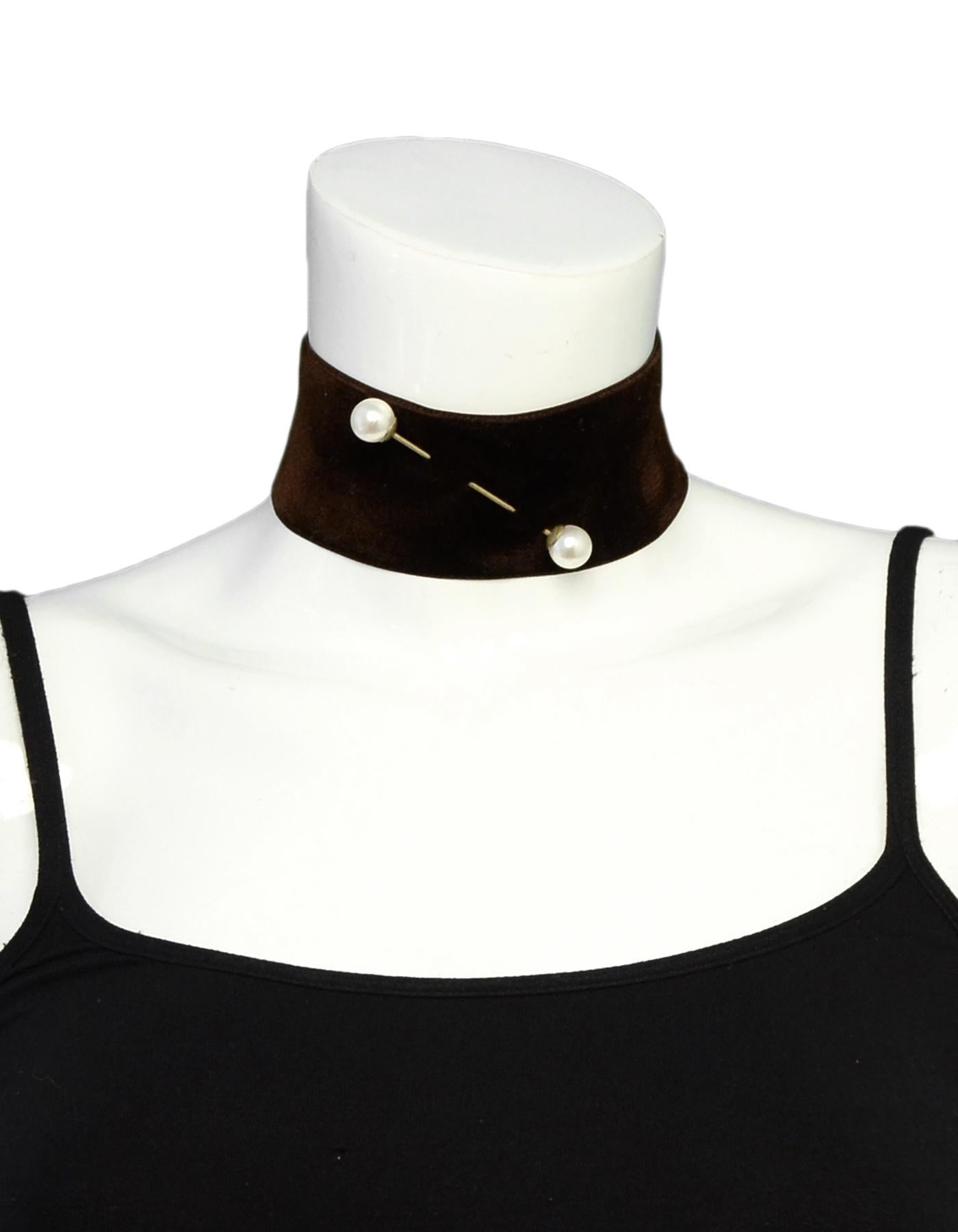 Dries Van Noten Brown Velvet Choker w/ Pearl
Year of Production: 2016
Color: Brown
Materials: Velvet, faux pearl
Hallmarks: Dries Van Noten (on back)
Closure/Opening: Two back snap closures
Overall Condition: Excellent pre-owned condition
Estimated