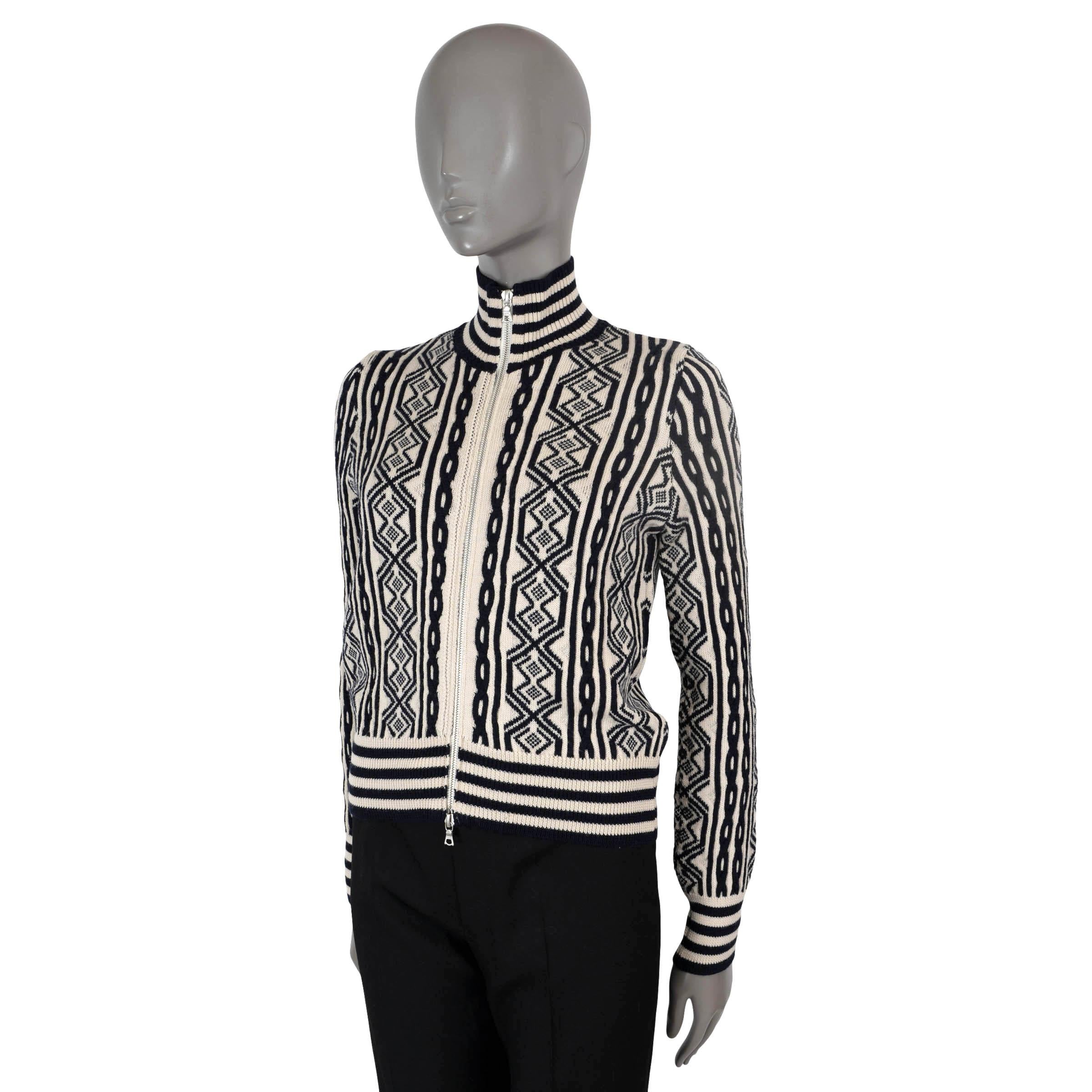 100% authentic Dries van Noten intarsia cardigan in cream and navy blue wool (100%). Features chunky cable-knit details and striped rib-knit trims. Closes with a zipper on the front and is unlined. Has been worn and is in excellent