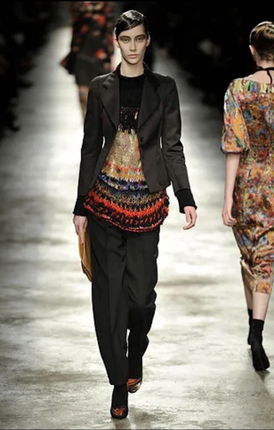 Super rare, super collectible vintage Dries Van Noten distressed jumper from the Fall 2008 collection - Look 16 on the runway. Made from wool/cashmere/paper mix, it is a hand knitted piece with a loose knit and fabulous grungy, lived in feel. Size S