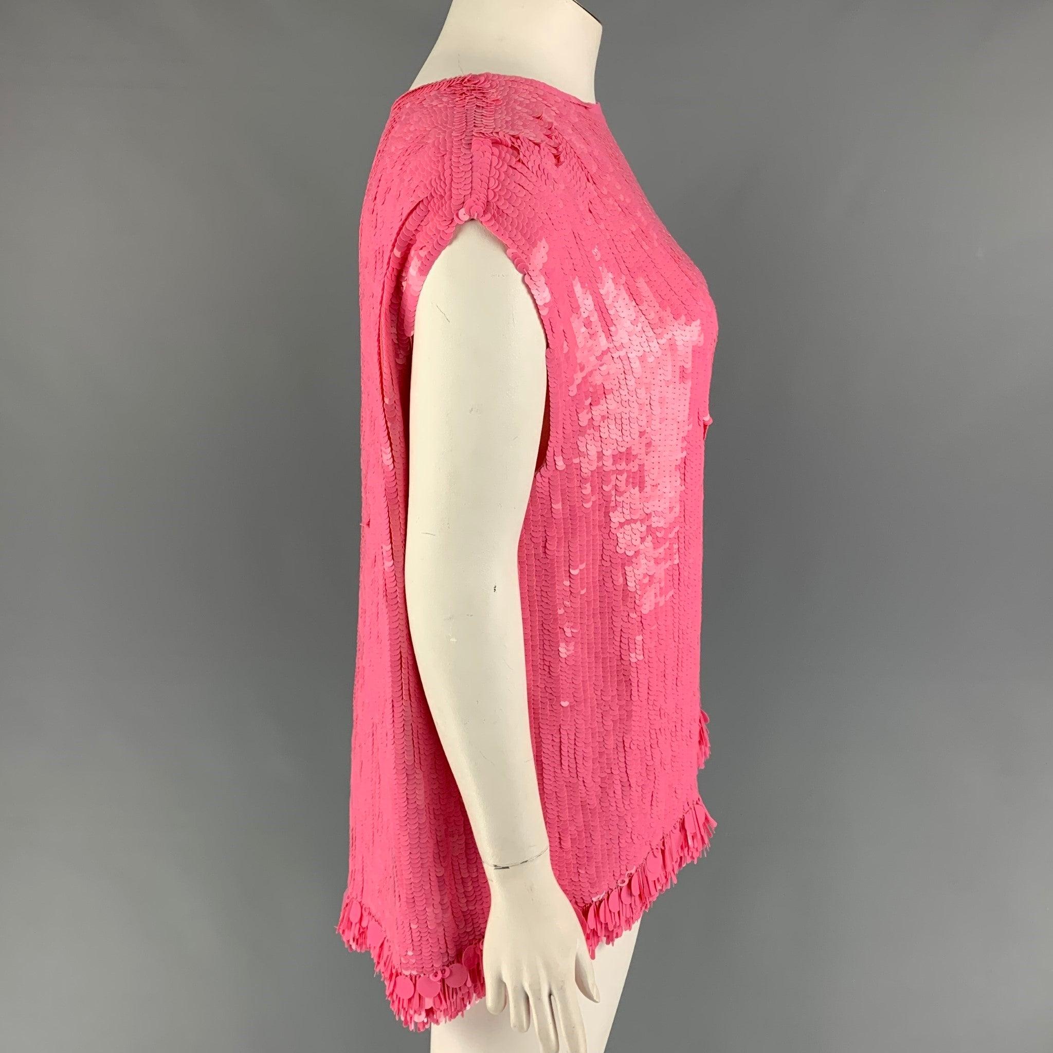 DRIES VAN NOTEN Fall-Winter 2021 dress top comes in a pink viscose featuring a sequined design throughout and a sleeveless style.
Excellent
Pre-Owned Condition. 

Marked:  42 

Measurements: 
 
Shoulder: 20 inches Bust: 42 inches Length: 29 inches 
