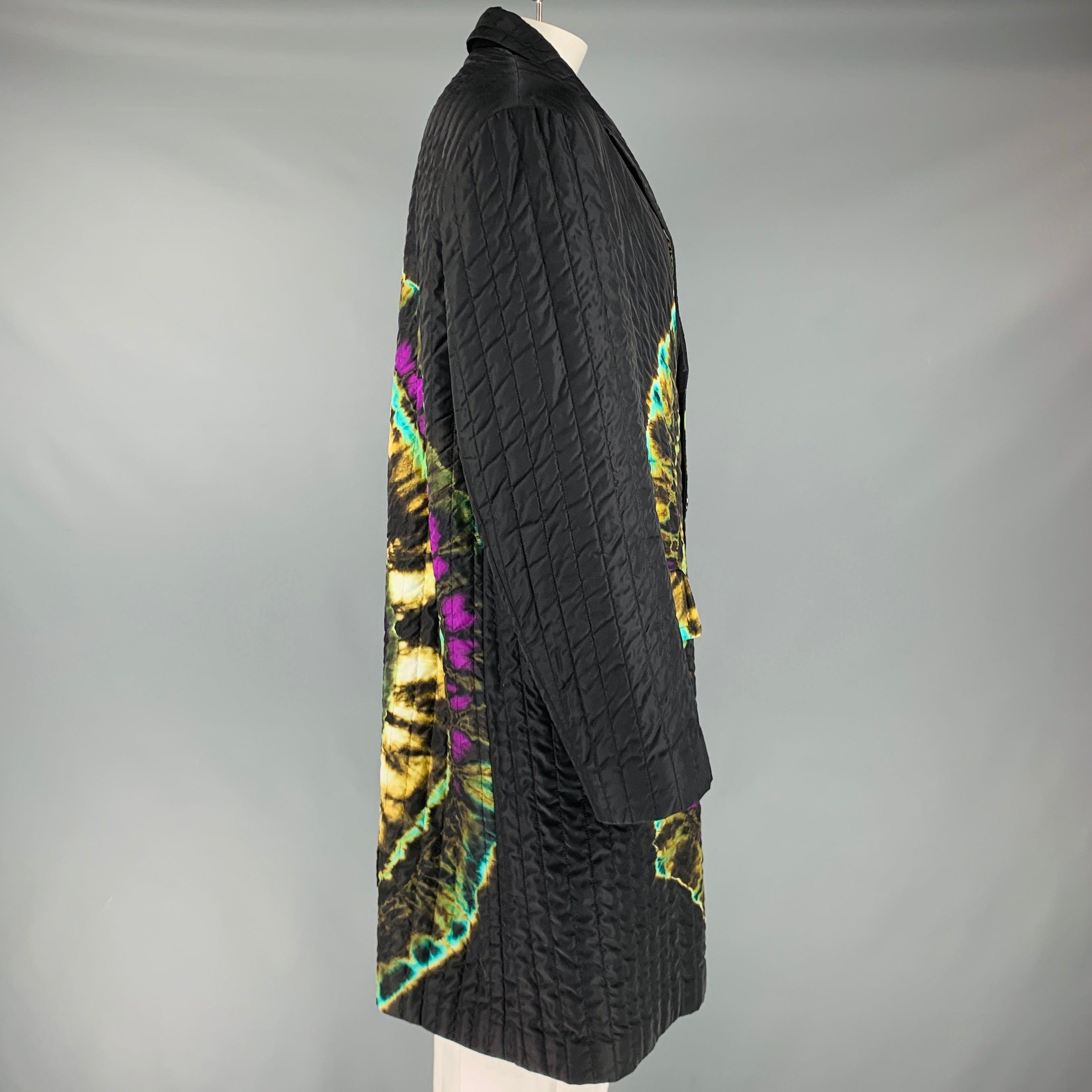 DRIES VAN NOTEN FW19 coat
in a
black polyamide blend featuring multi-color vibrant tie dye design, single breasted style, and three button closure. Made in Belgium.Excellent Pre-Owned Condition. 

Marked:   54 

Measurements: 
 
Shoulder: 20 inches