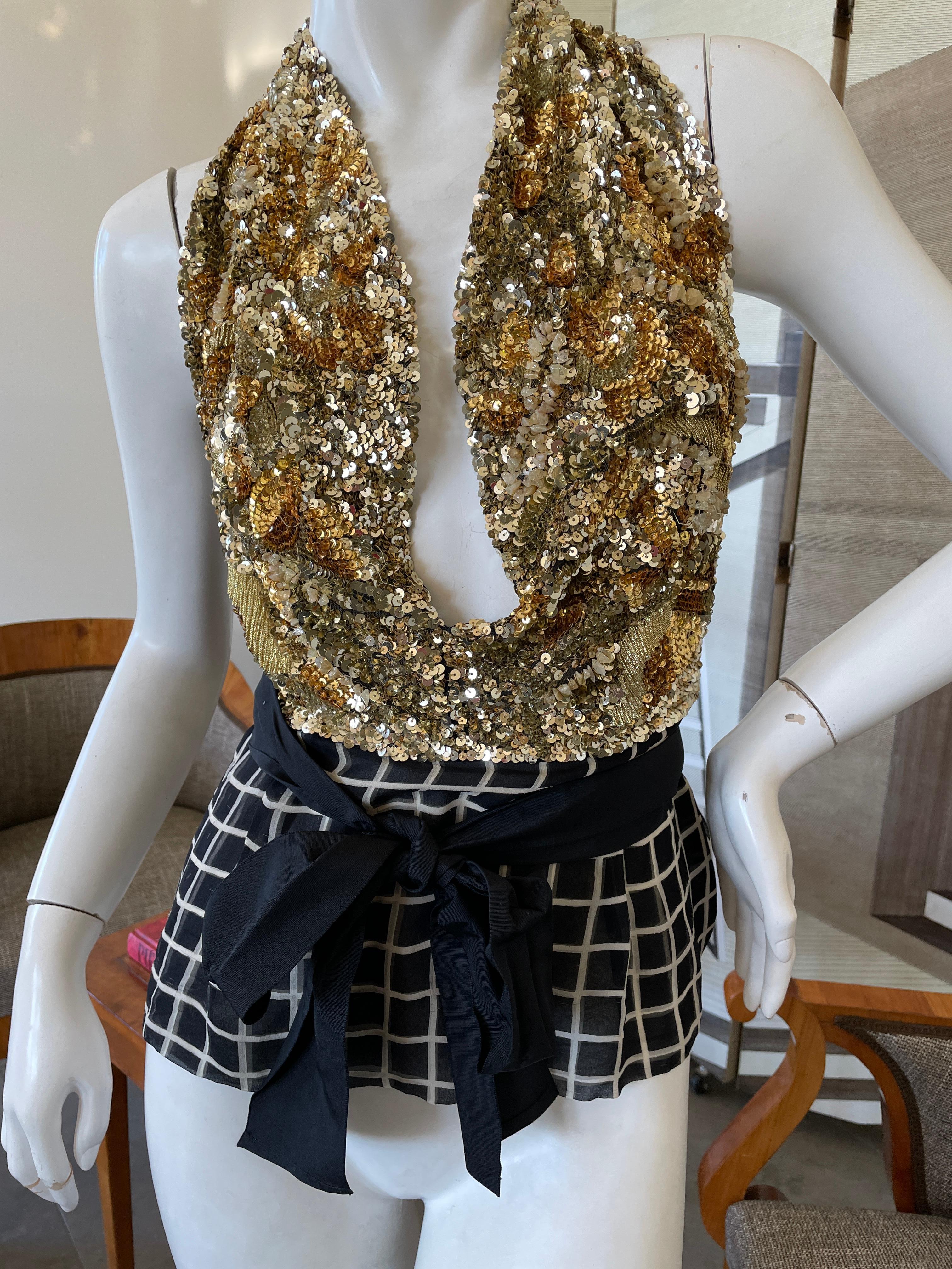 Dries van Noten Gold Embellished Low Cut SIlk Halter Top.
Please use the zoom feature to see all the incredible hand work , incredible.
Size 42
 Bust 38