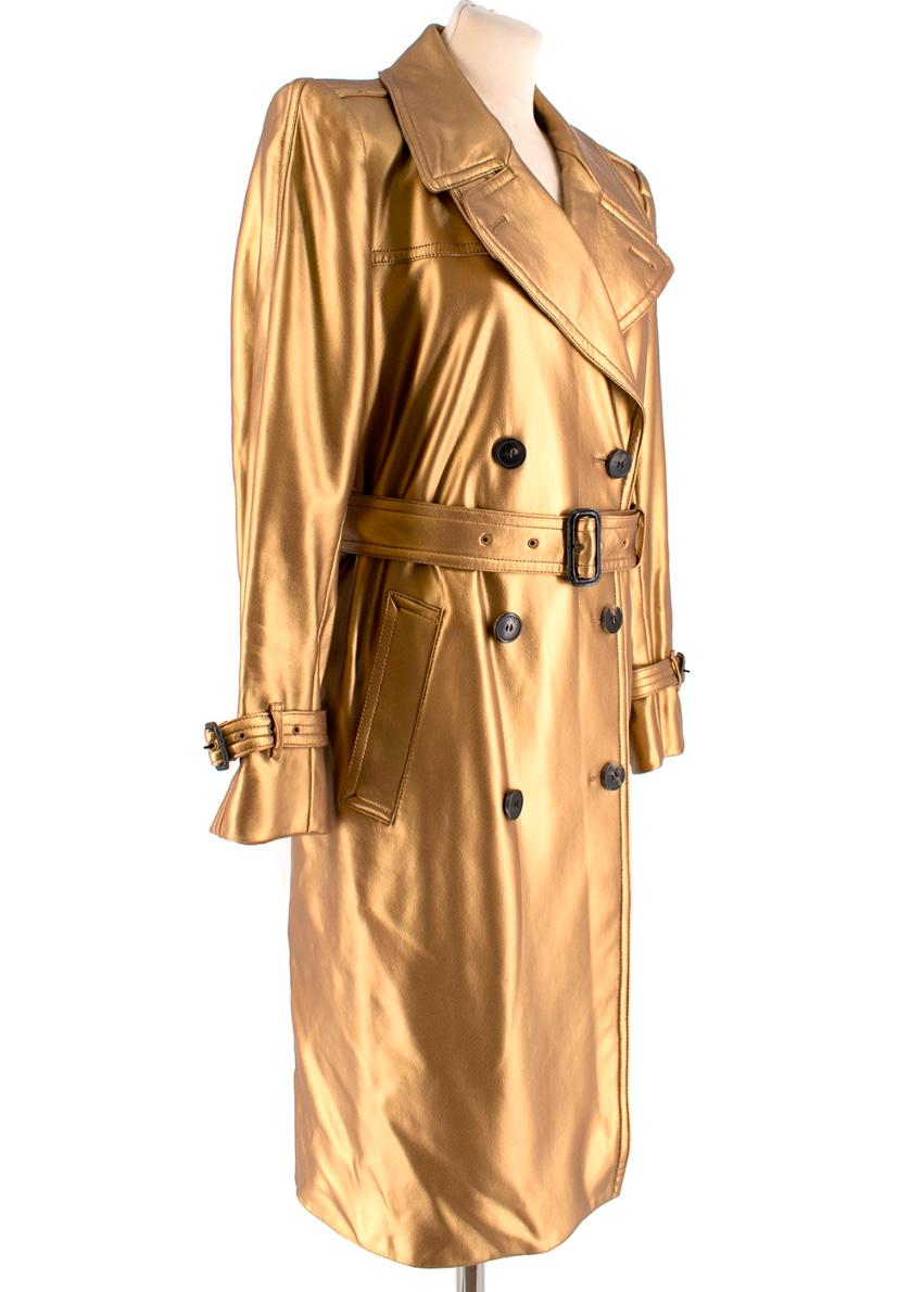 Dries Van Noten - gold metallic trench coat

- button up front - belted waist - slightly padded shoulders - buckle cuffs - split up the back

Please note, these items are pre-owned and may show signs of being stored even when unworn and unused. This