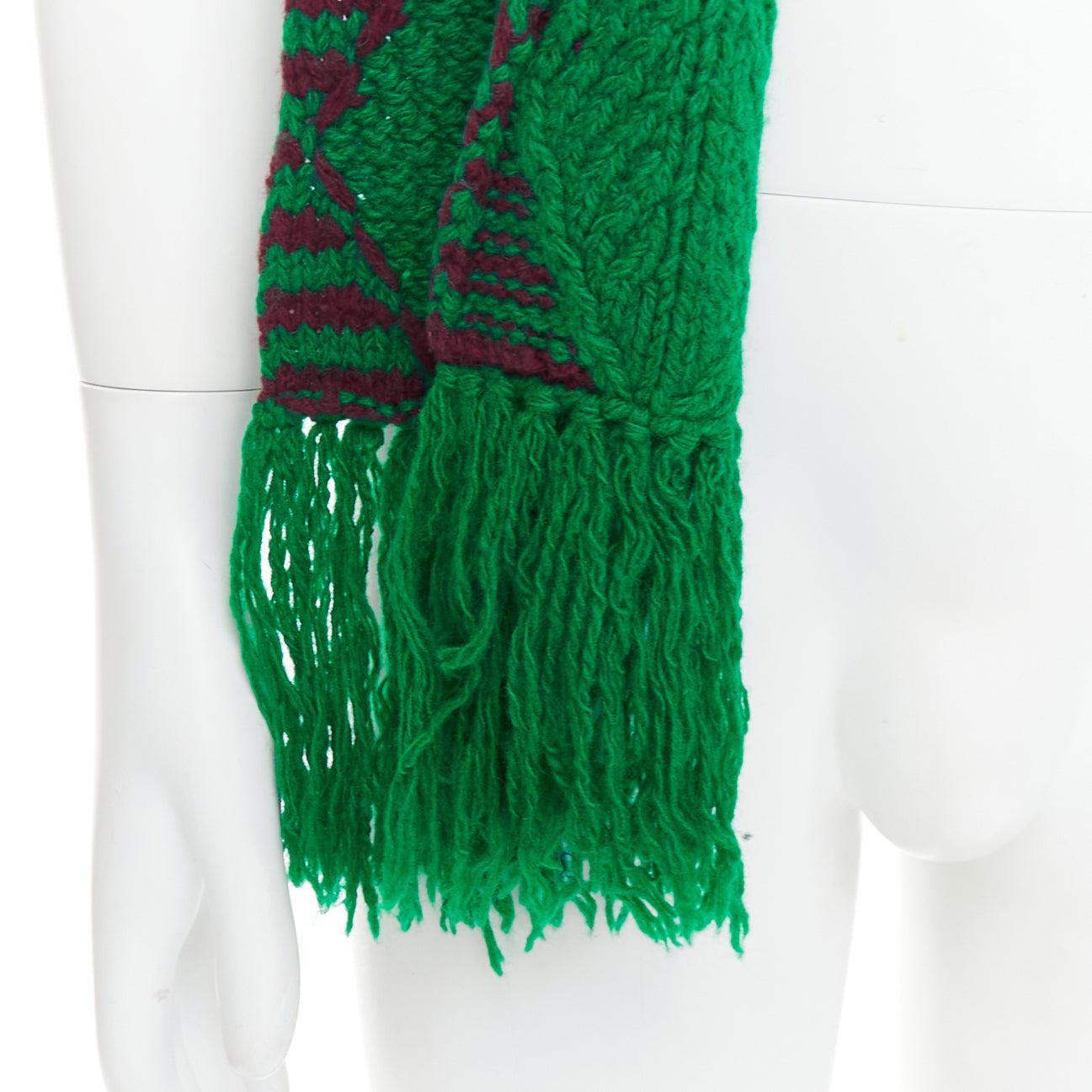 DRIES VAN NOTEN green brown knitted long wrap scarf
Reference: PRWU/A00173
Brand: Dries Van Noten
Material: Feels like wool
Color: Green, Brown
Pattern: Solid

CONDITION:
Condition: Very good, this item was pre-owned and is in very good condition. 