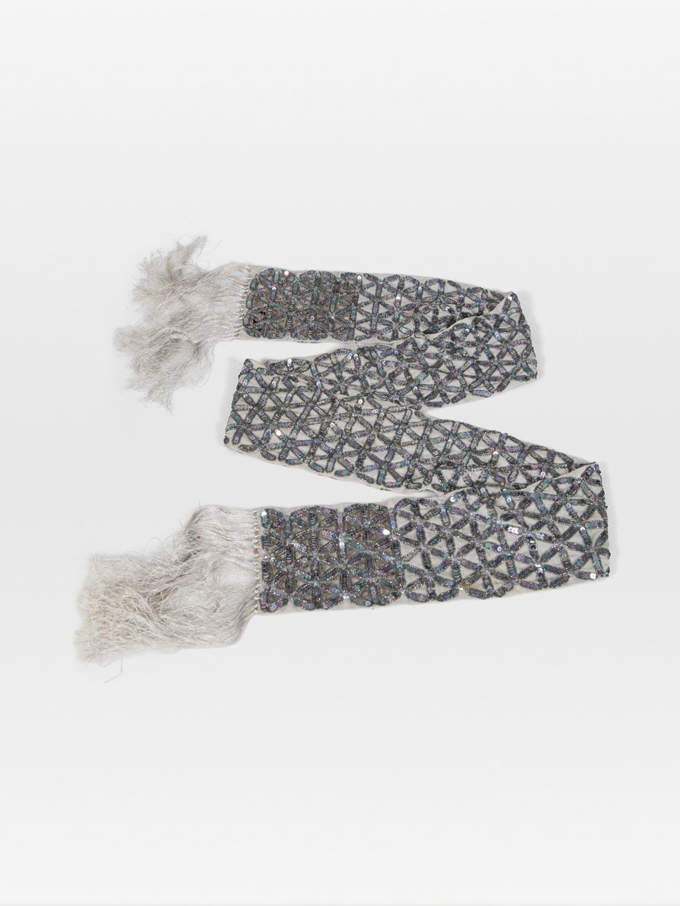 CONDITION is Very Good. Hardly any visible wear to the scarf is evident on this used Dries Van Noten designer resale item.
 
 Details
 
 
 Grey
 
 Silk
 
 Scarf
 
 Rectangular
 
 Sequin embroidered
 
 Cut out detail
 
 Tassel detail
 
 
 

 
 Made