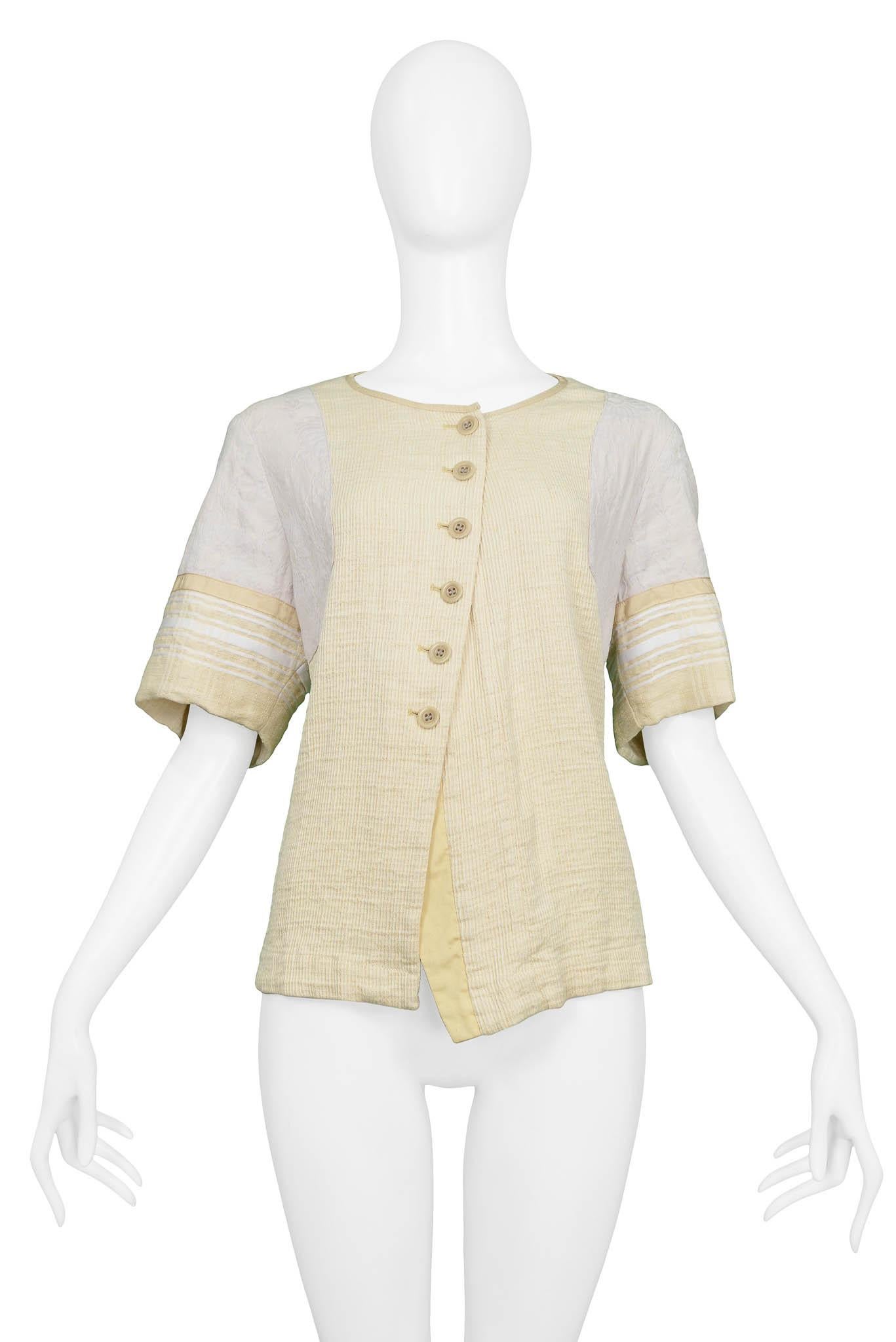 Resurrection Vintage is excited to offer a vintage Dries Van Noten ivory top featuring an asymmetrical front, button front closure, and multi-colored sleeves.

Dries Van Noten
Size 44
Excellent Vintage Condition
Authenticity Guaranteed