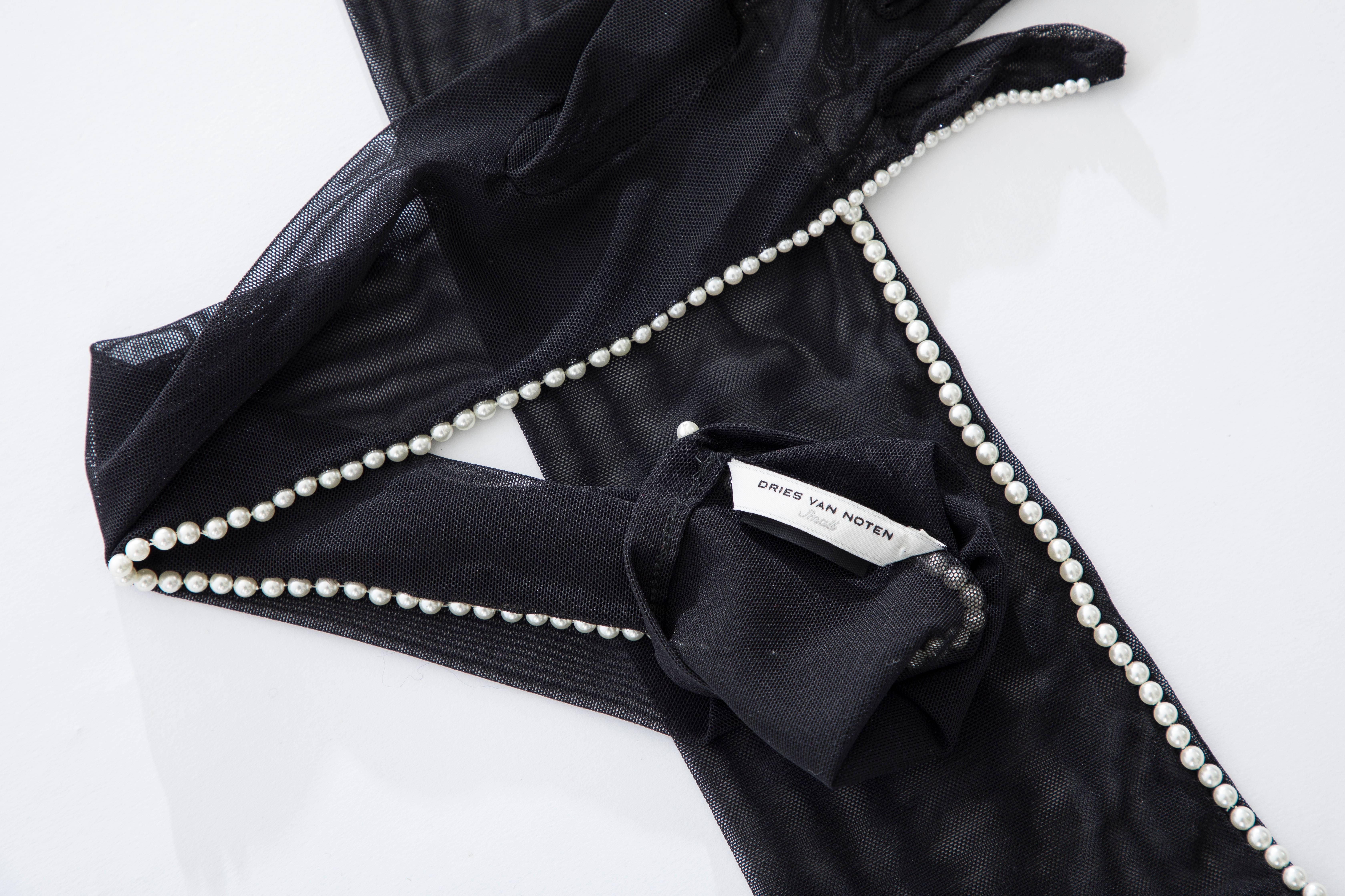 black gloves with pearls