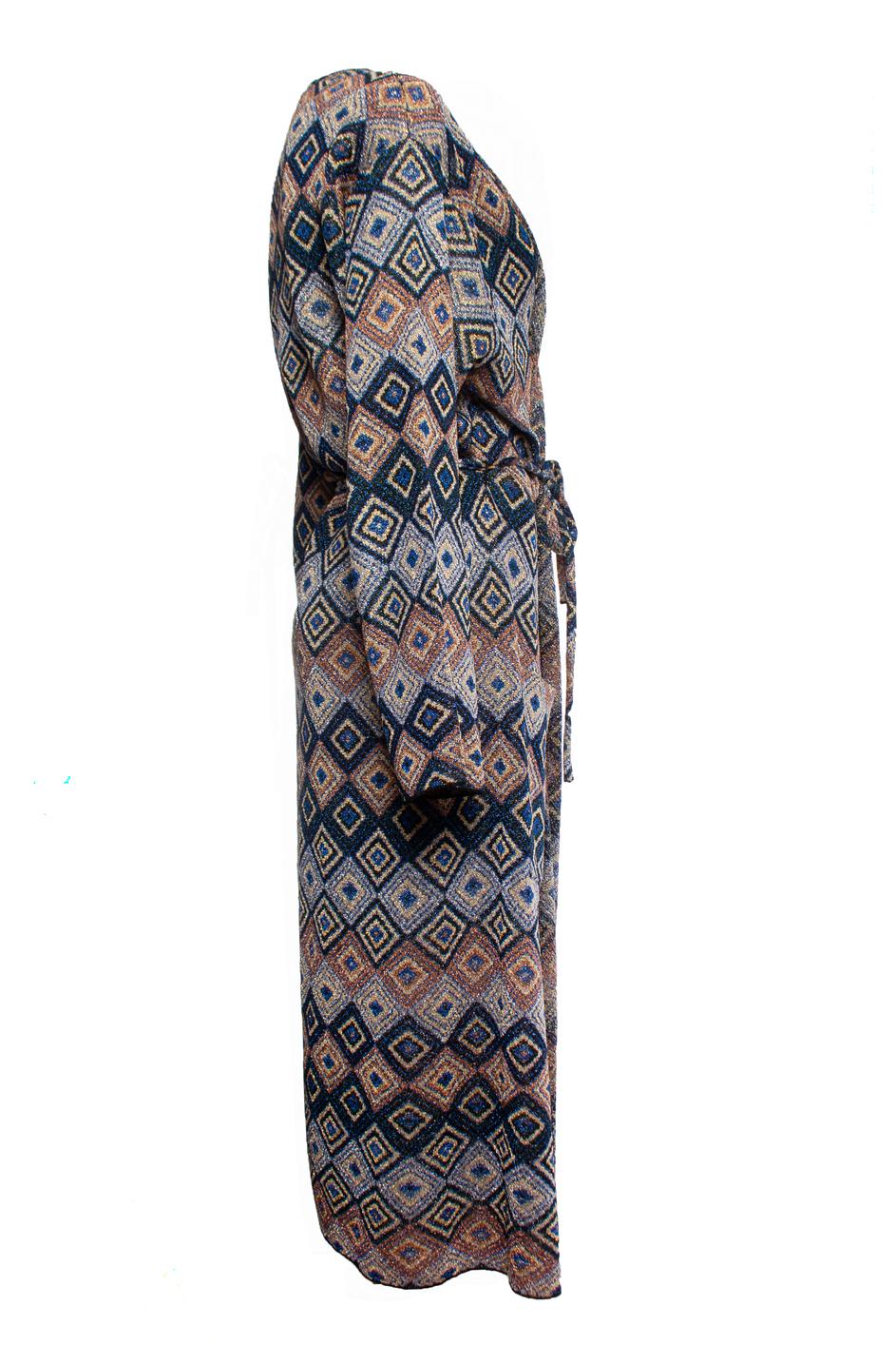 Dries van Noten, Lurex cardigan with geometric print and waist belt. The item has two pockets on the waist. The item is in very good condition

• CONDITION: very good condition 

• SIZE: M 

• MEASUREMENTS: length 125 cm, width 50 cm, waist 48 cm,