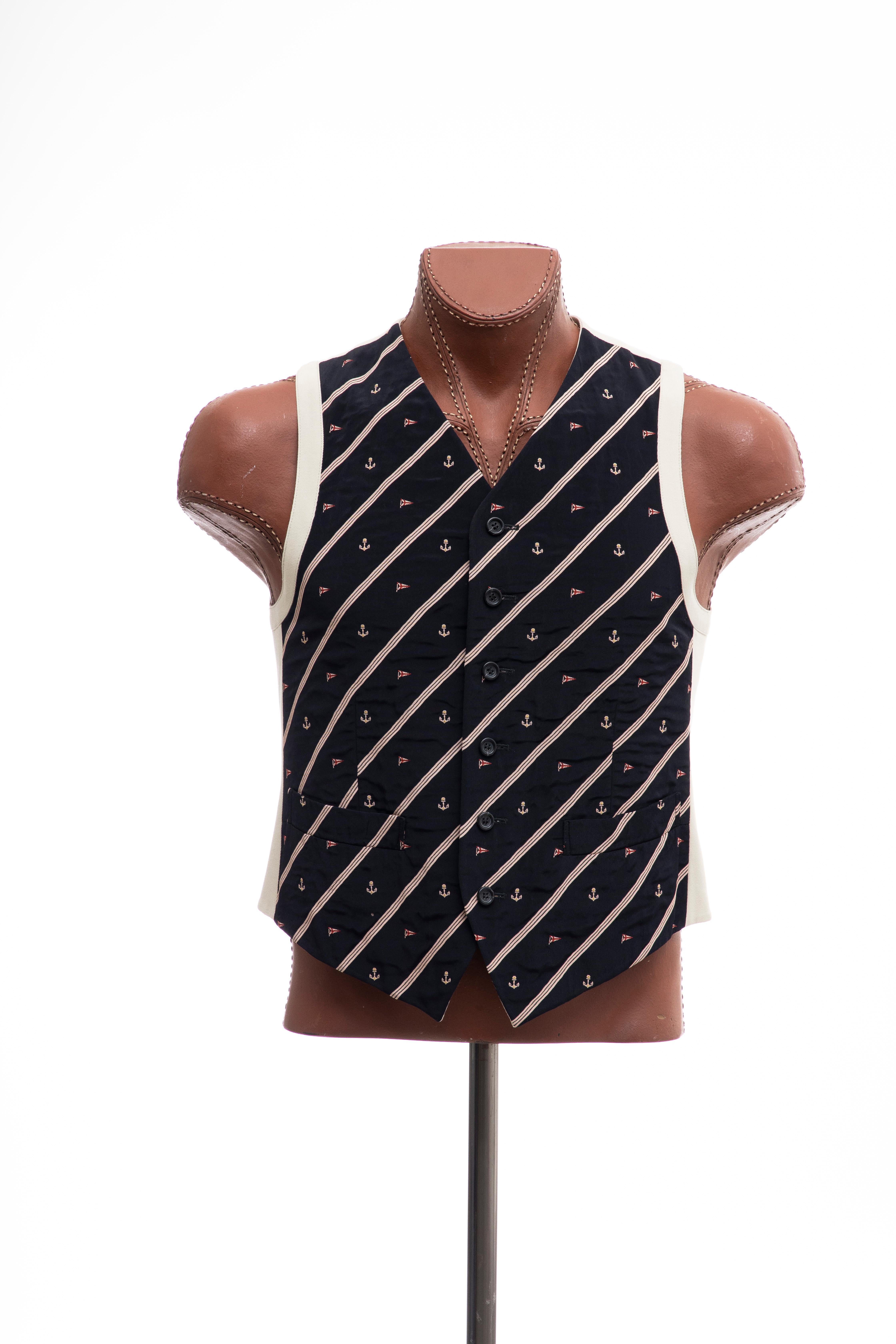 Dries Van Noten suit vest with nautical motifs and stripes at front,dual welt pockets at front, tonal satin lining and button closures at front.

IT. 48, US. 8

Chest: 40, Length: 24

Fabric: 48% Acetate, 48% Rayon, 4% Polyester