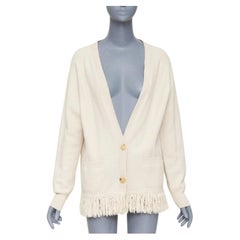 Cardigan oversize in lana con bottoni sul davanti e bordi con frange di Dries van Noten  L