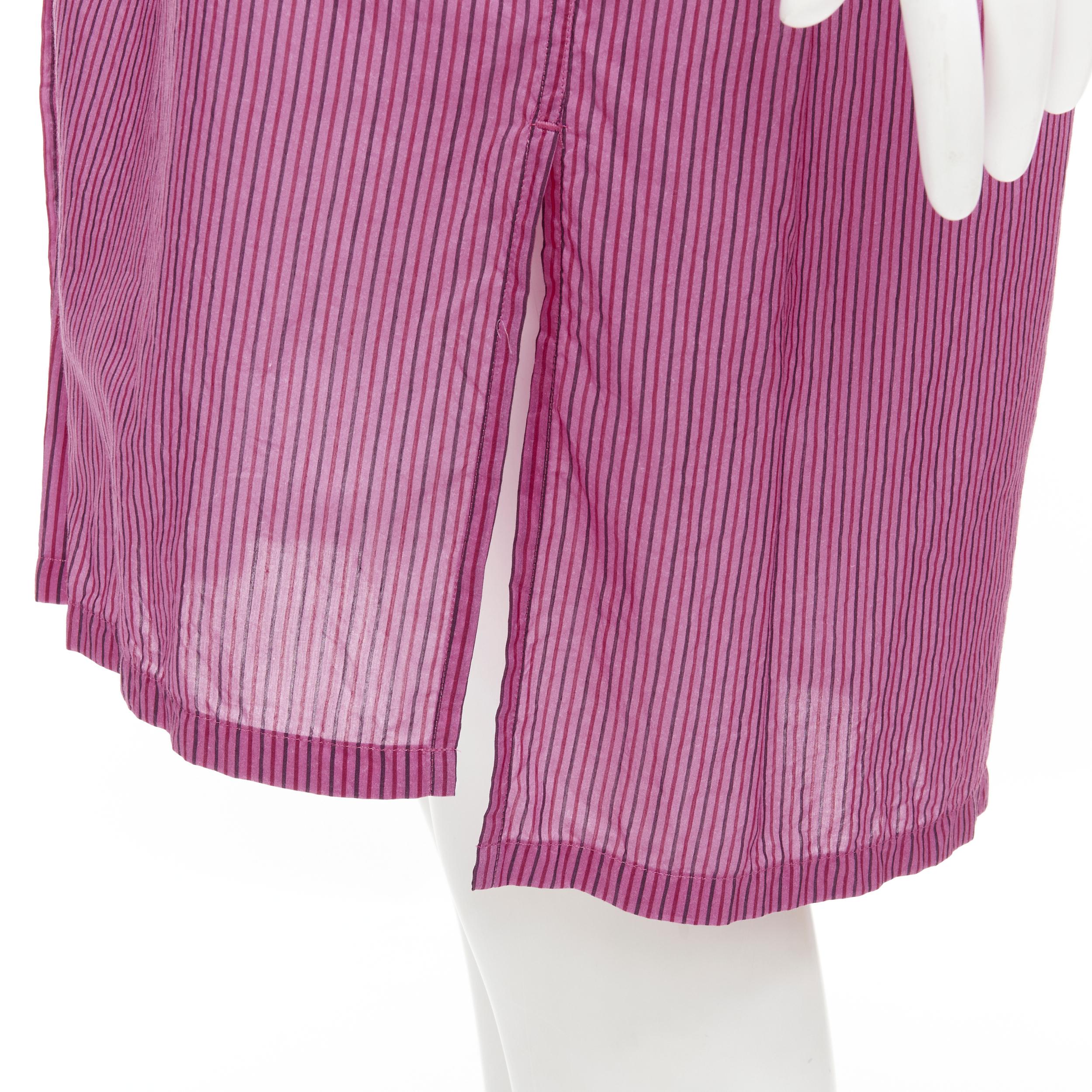 DRIES VAN NOTEN pinstripe cotton cupro pink hem shirt dress FR34 XS 
Reference: CELG/A00165 
Brand: Dries Van Noten 
Designer: Dries Van Noten 
Material: Cotton 
Color: Pink 
Pattern: Striped 
Closure: Button 
Extra Detail: Breast pocket. 
Made in: