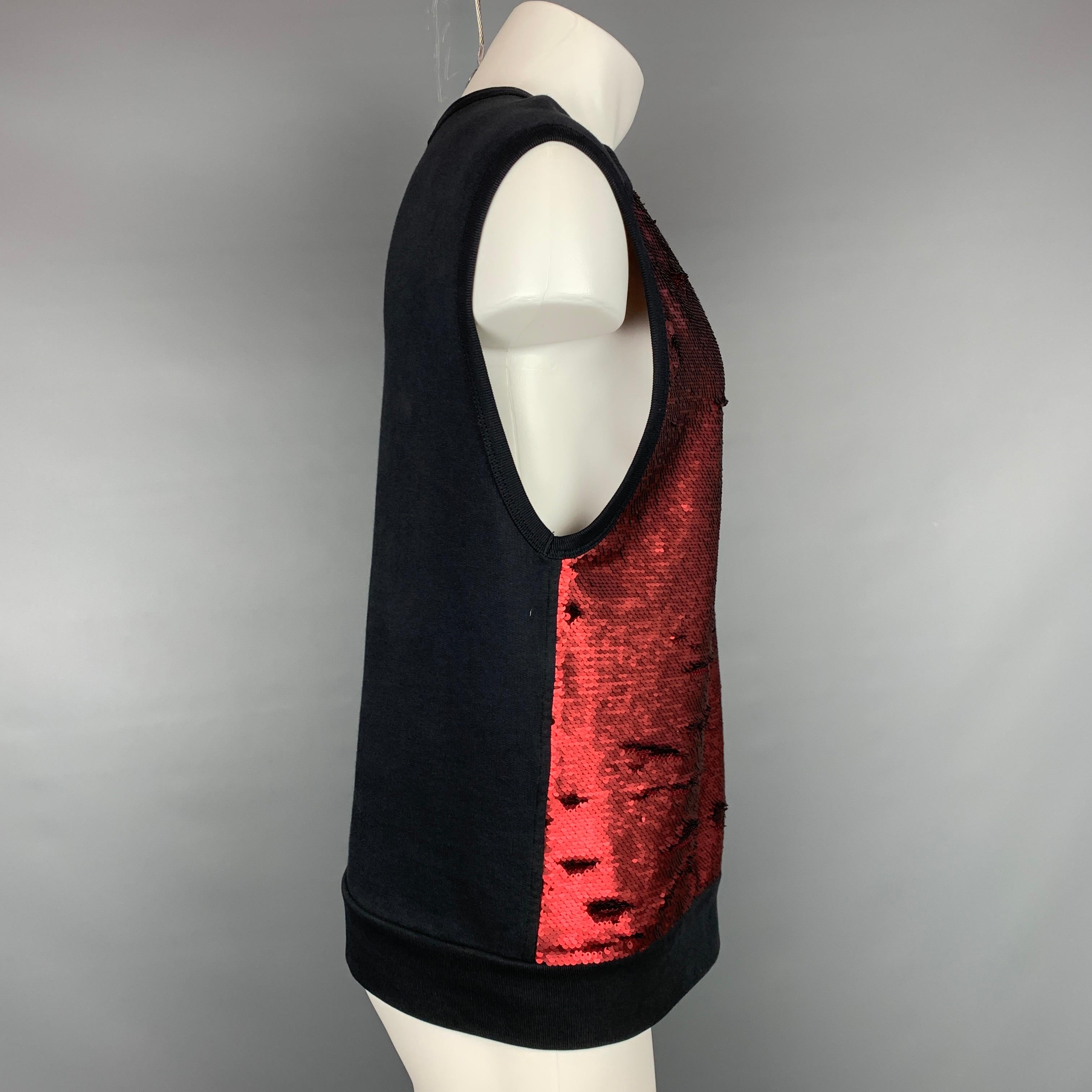 DRIES VAN NOTEN S/S 16 vest comes in a red & black sequined cotton / polyester featuring a crew-neck. 

Very Good Pre-Owned Condition.
Marked: M

Measurements:

Shoulder: 19 in.
Chest: 42 in.
Length: 25 in. 