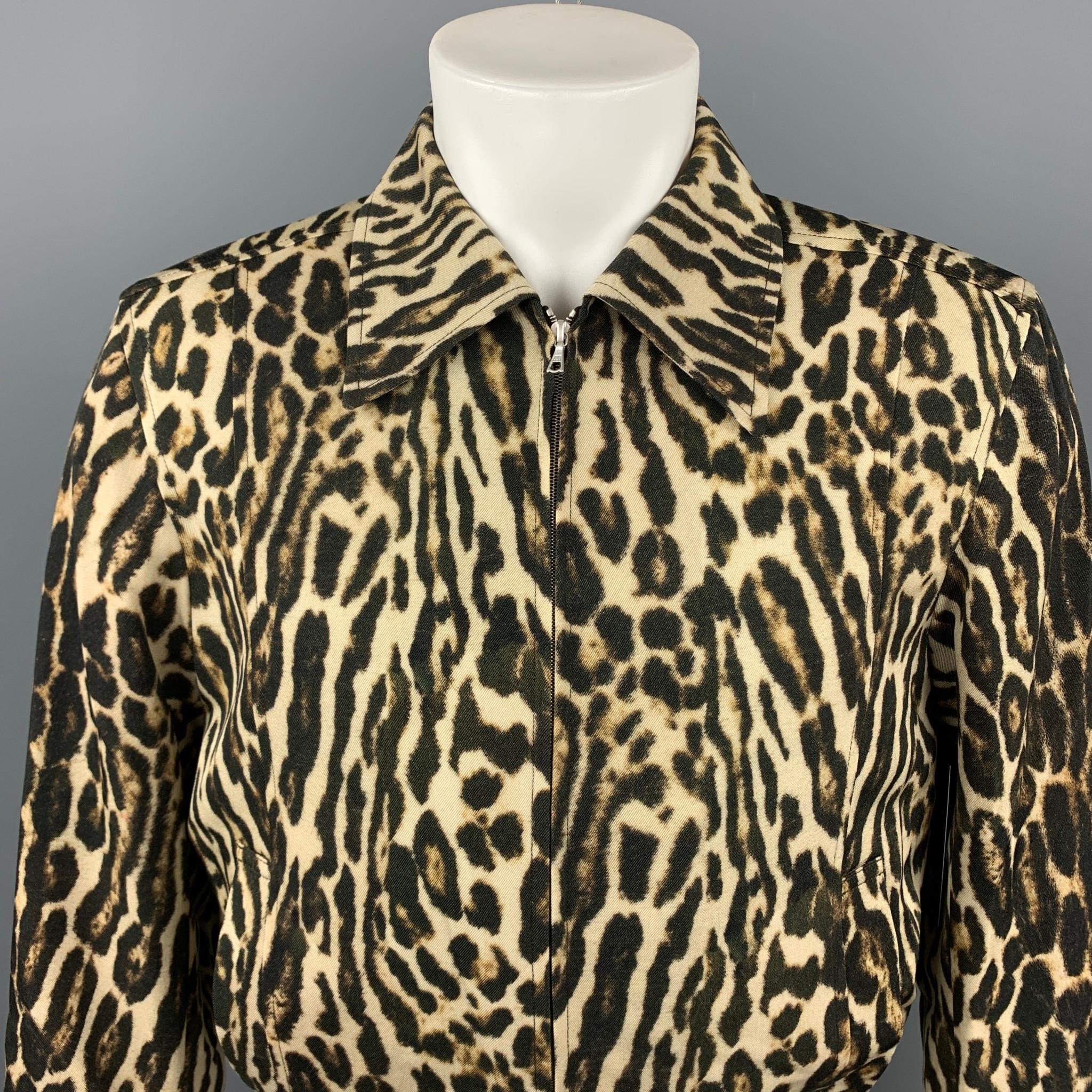 DRIES VAN NOTEN S/S 2020 jacket comes in a black & tan leopard print wool with a full liner featuring a elastic waistband, slit pockets, pointed collar, and a zip up closure. Made in Poland.

New With Tags.
Marked: 44

Measurements:

Shoulder: 18.5