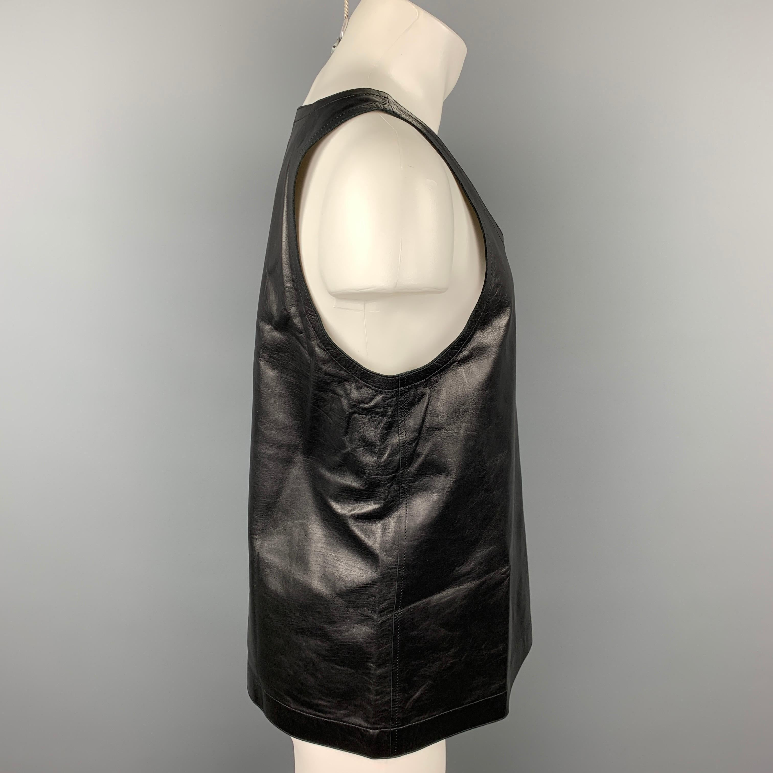 DRIES VAN NOTEN S/S 20 tank top comes in a black leather featuring a side zipper closure design.

New With Tags. 
Marked: L
Original Retail Price: $1,275.00

Measurements:

Shoulder: 14.5 in.
Chest: 40 in.
Length: 26 in. 