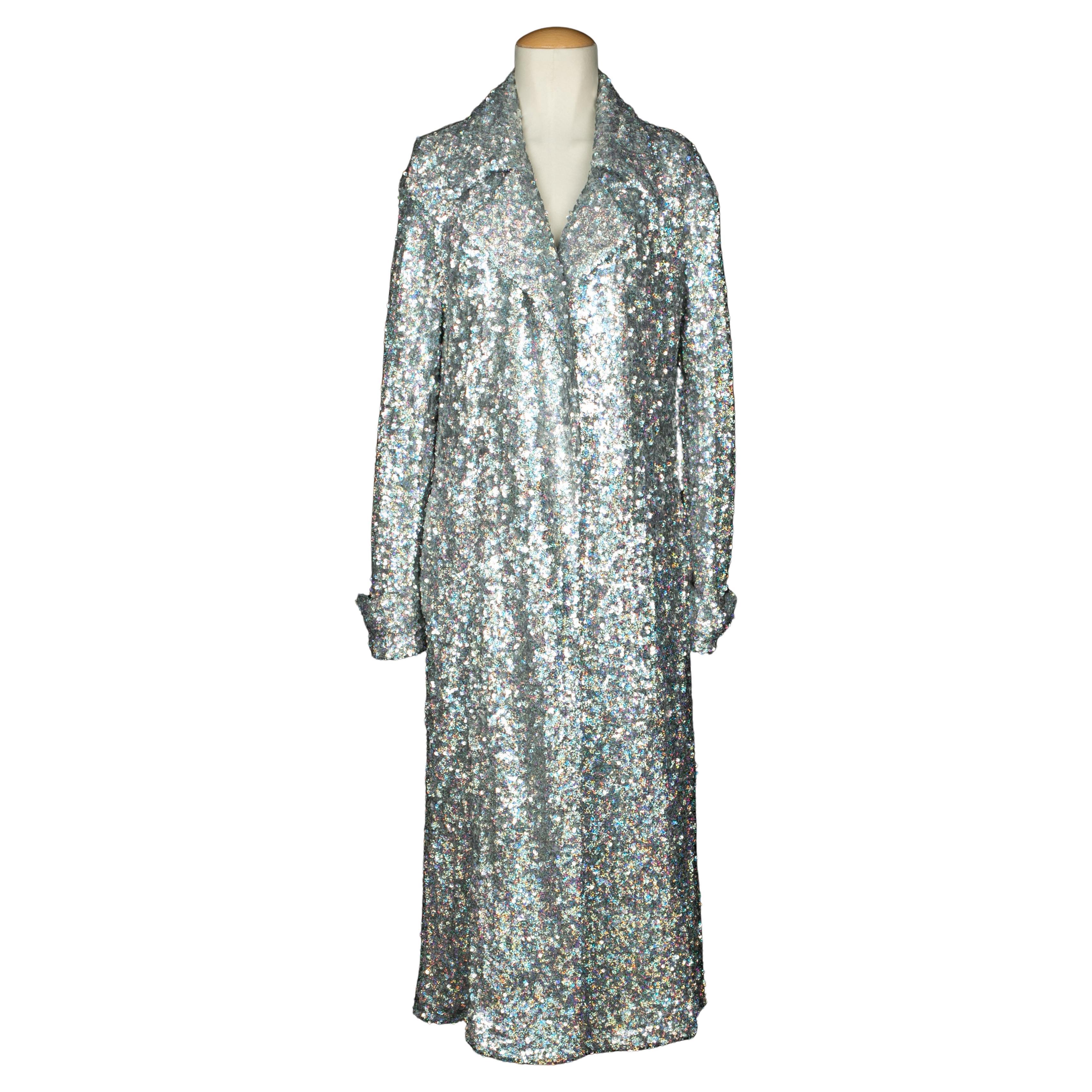 DRIES VAN NOTEN - Cloth coat sewn with silvery sequins. Extra-small size indicated, but it fits a 38FR. 2022 Fall-Winter Collection.

Condition:
Very good condition

Dimensions:
Shoulder width: 44 cm - Sleeve length: 60 cm - Length: 130 cm

SKU:M126