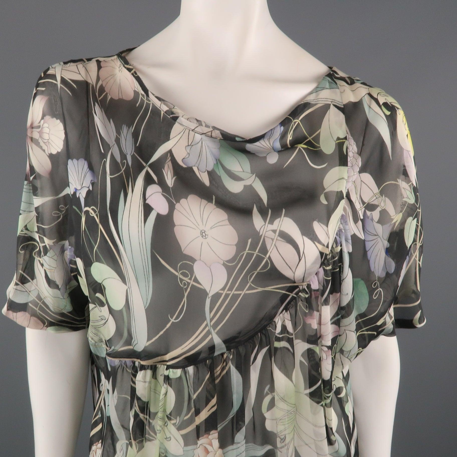 DRIES VAN NOTEN oversized blouse comes in floral print silk chiffon with a boat neck, short sleeves, and asymmetrical gathered detail. 
Excellent Pre-Owned Condition.
 

Marked:   IT 42
 

Measurements: 
  
l	Shoulder: 16 inches 
l	Bust: 48 inches