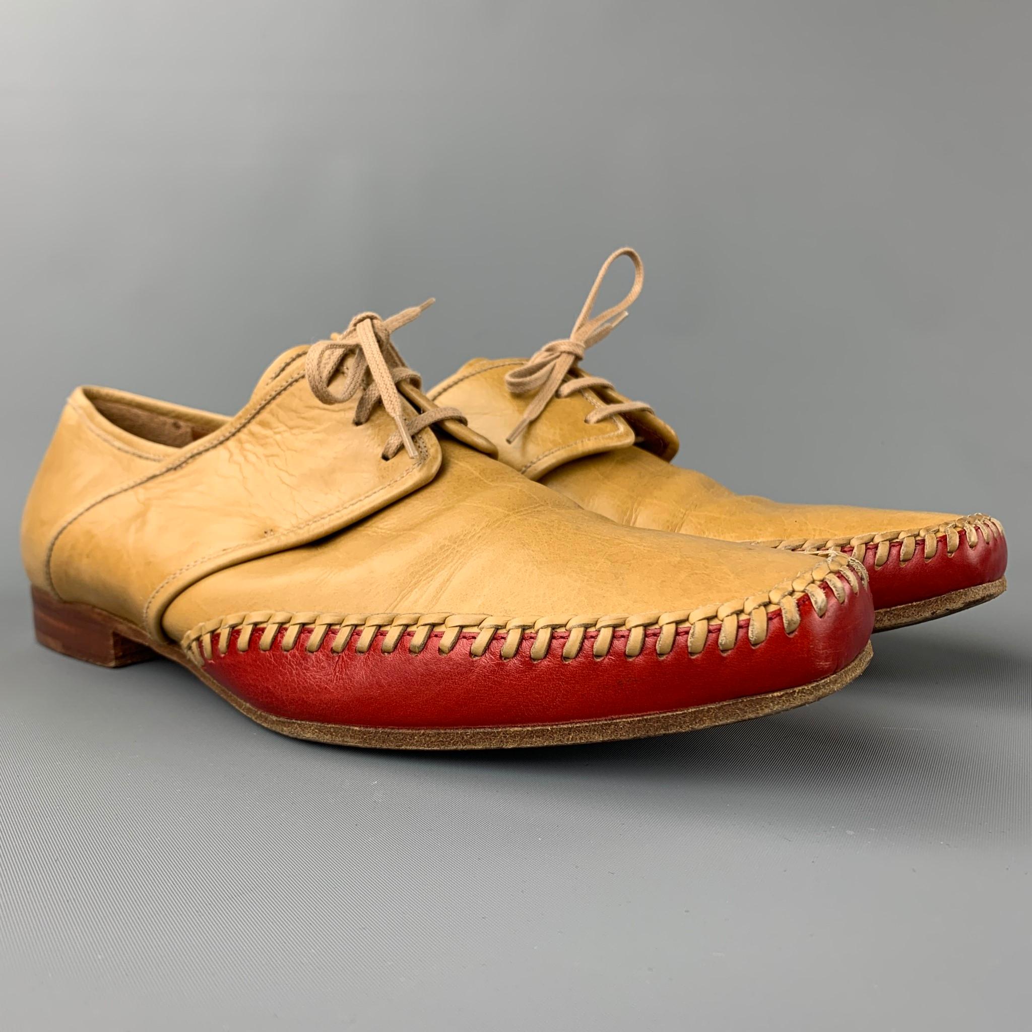 DRIES VAN NOTEN shoes comes in a tan leather with a red trim featuring a square toe, braided detail, wooden sole, and a lace up closure. Moderate wear. Made in Italy.

Good Pre-Owned Condition.
Marked: EU 43

Outsole:

11.5 in. x 3.5 in.