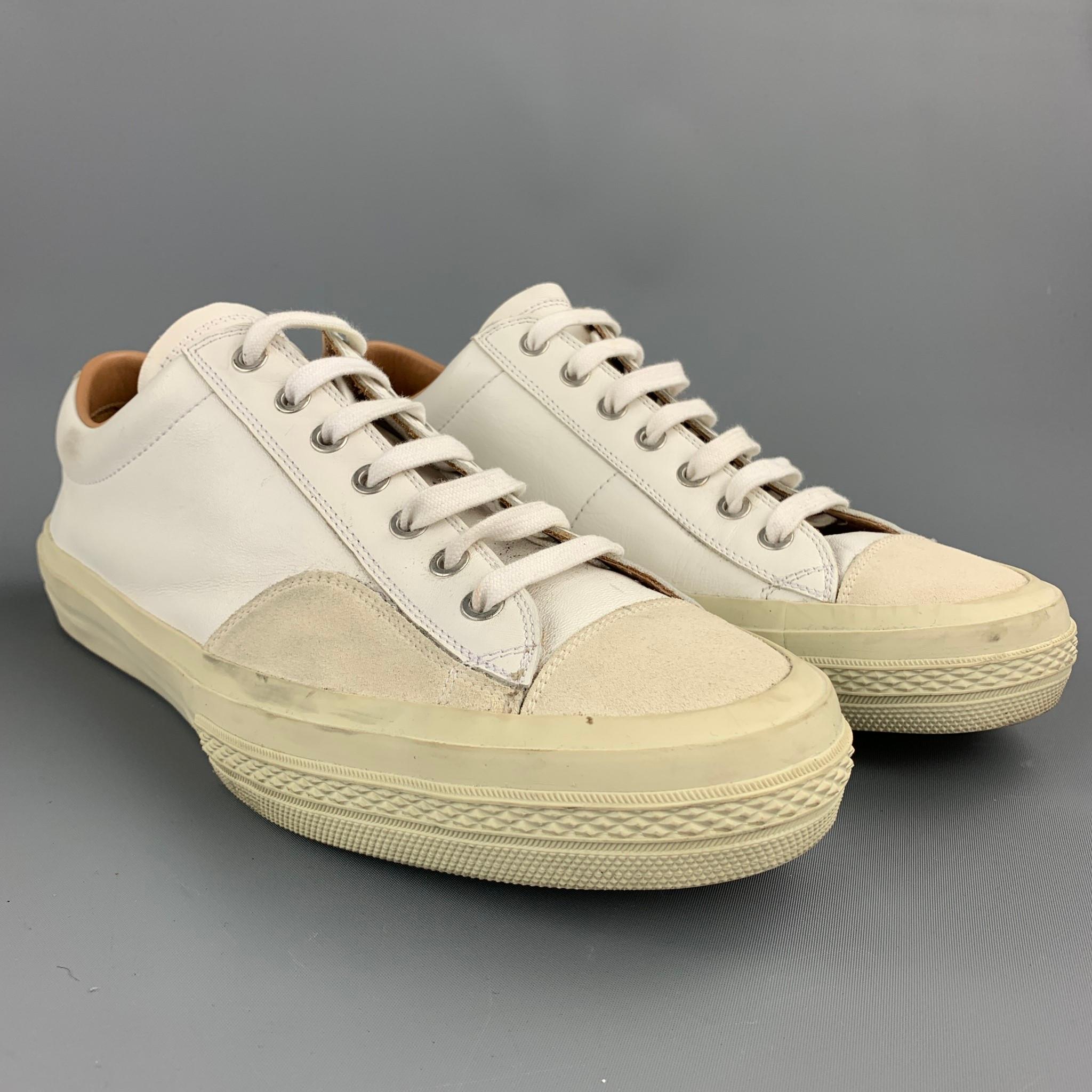 DRIES VAN NOTEN sneakers comes in a white mixed materials leather with a suede trim featuring a rubber sole and a lace up closure. Minor wear. Made in Italy. 

Very Good Pre-Owned Condition.
Marked: EU 43

Outsole: 

11.5 in. x 4  in. 