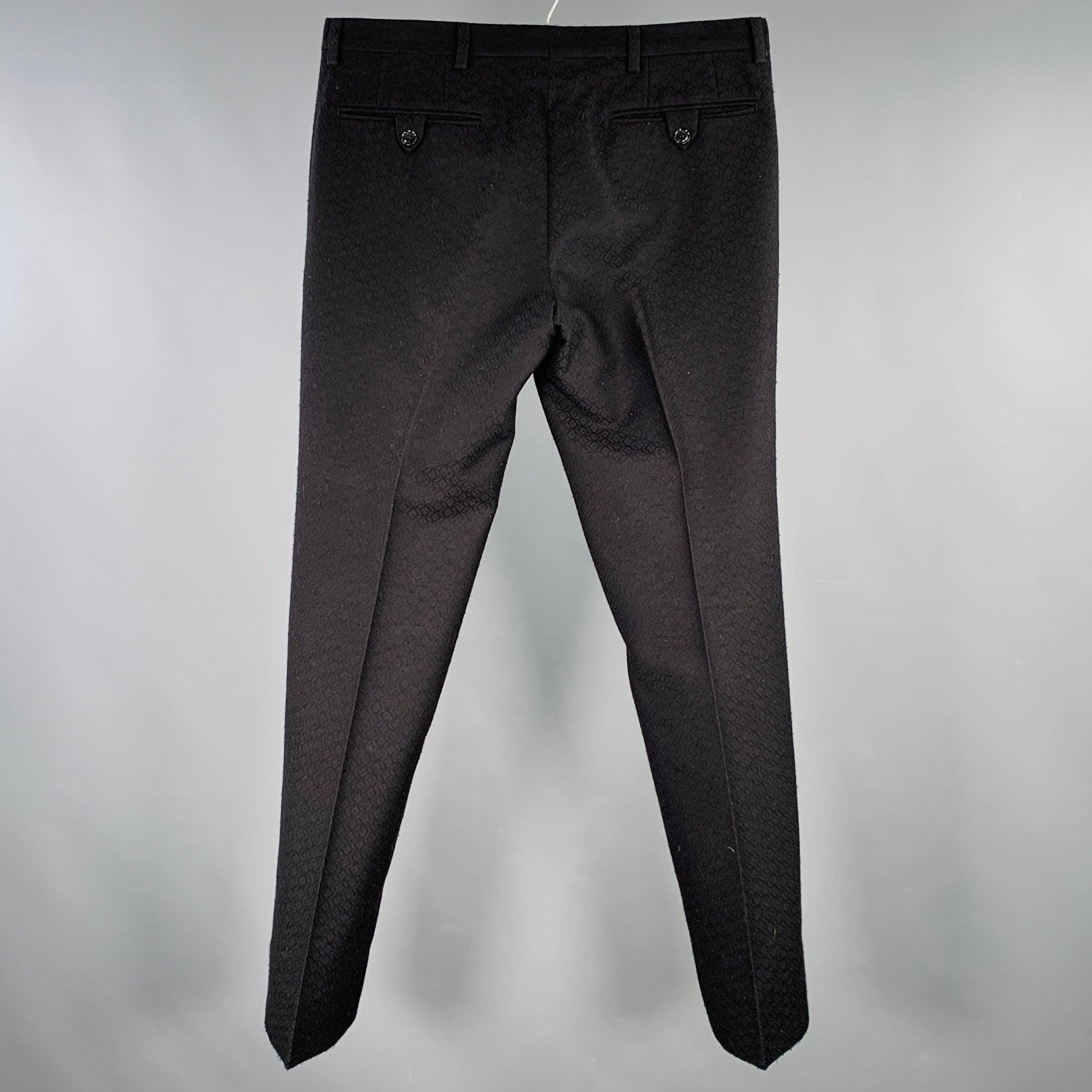 DRIES VAN NOTEN dress pants
in a black wool blend jacquard featuring a geometric pattern, flat front style, and zip fly closure.Very Good Pre-Owned Condition. Minor signs of wear. 

Marked:   IT 46 

Measurements: 
  Waist: 30 inches Rise: 8.5
