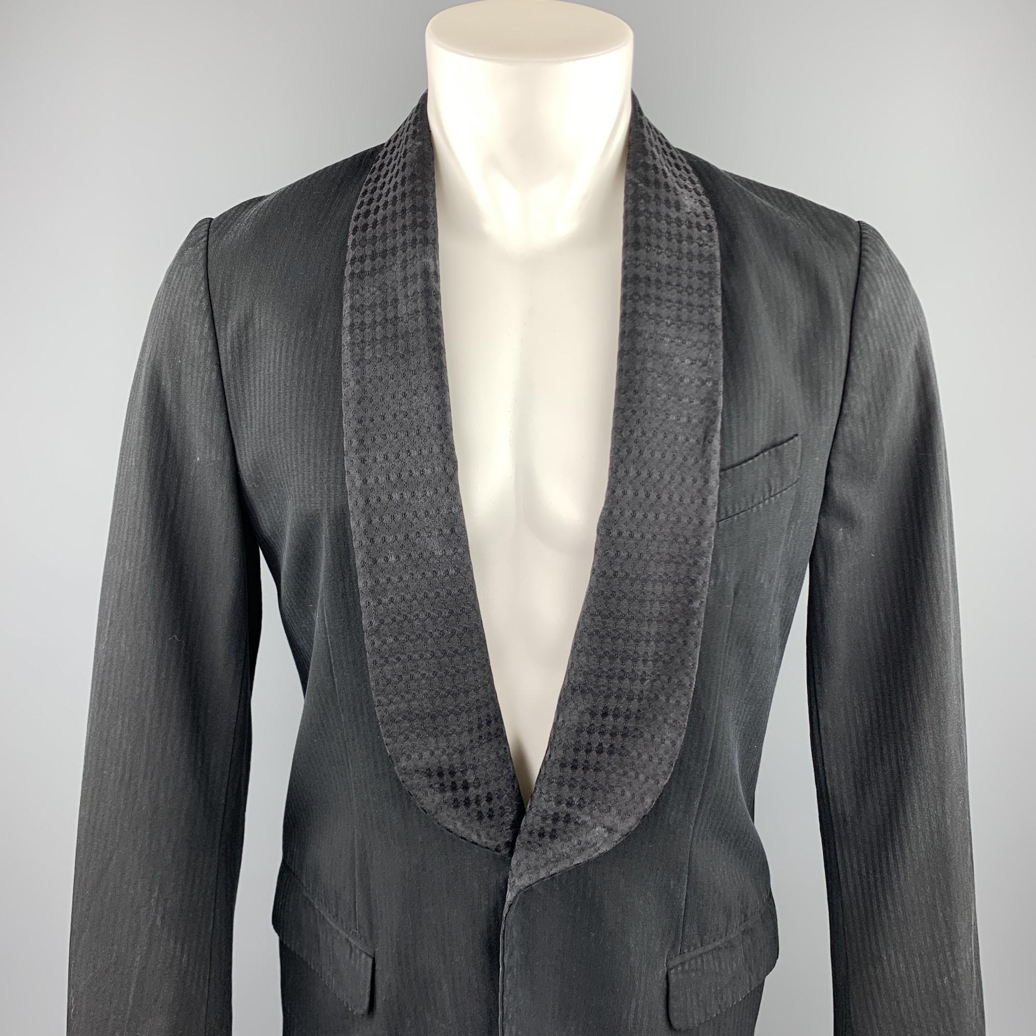 DRIES VAN NOTEN sport coat comes in a black on black stripe cotton / rayon featuring a shawl collar, flap pockets, and a single button closure. 

Very Good Pre-Owned Condition.
Marked: 46

Measurements:

Shoulder: 17 in. 
Chest: 38 in. 
Sleeve: 27.5