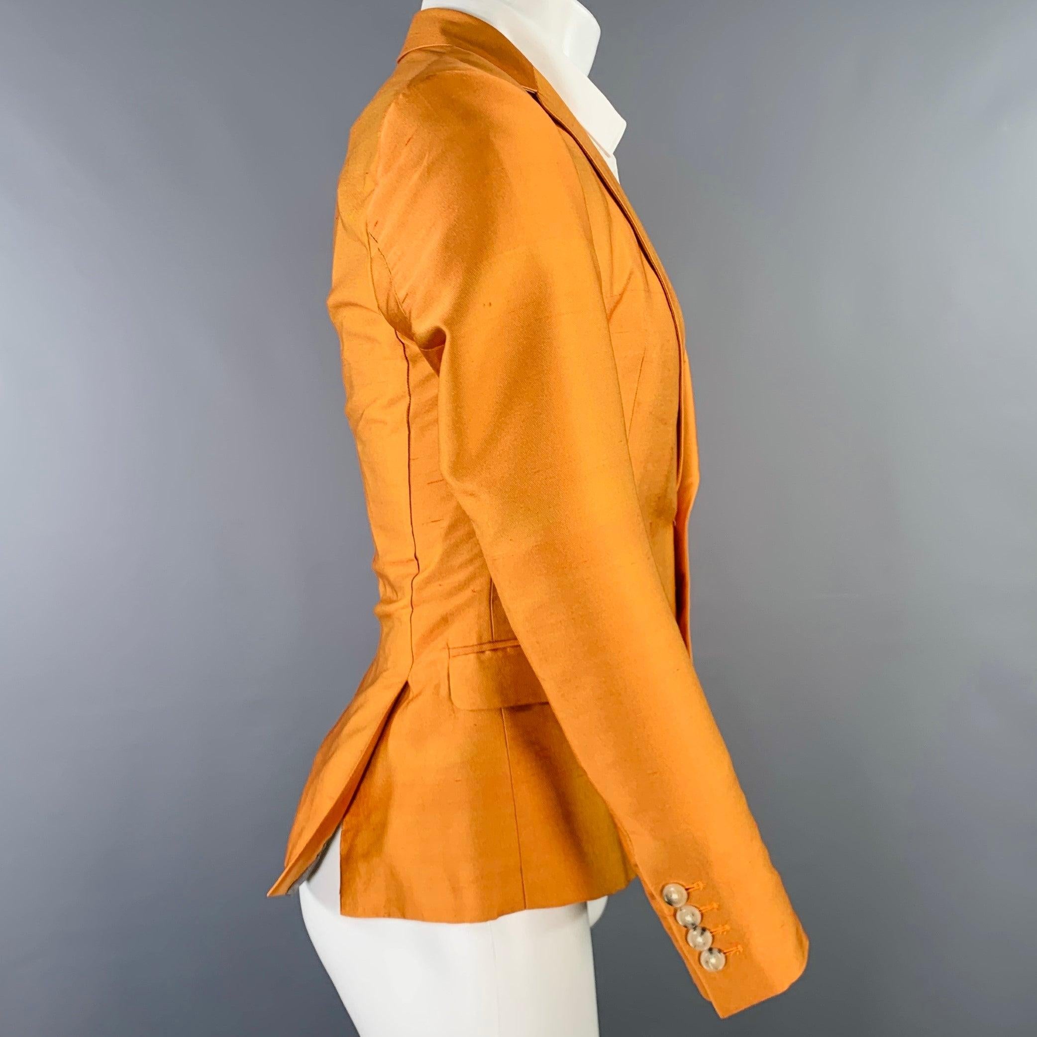 DRIES VAN NOTEN sport coat
in an orange polyester silk woven fabric featuring a notch lapel, double vented back, and double button closure. Excellent Pre-Owned Condition. 

Marked:   IT 46 

Measurements: 
 
Shoulder: 15 inches Chest: 36 inches