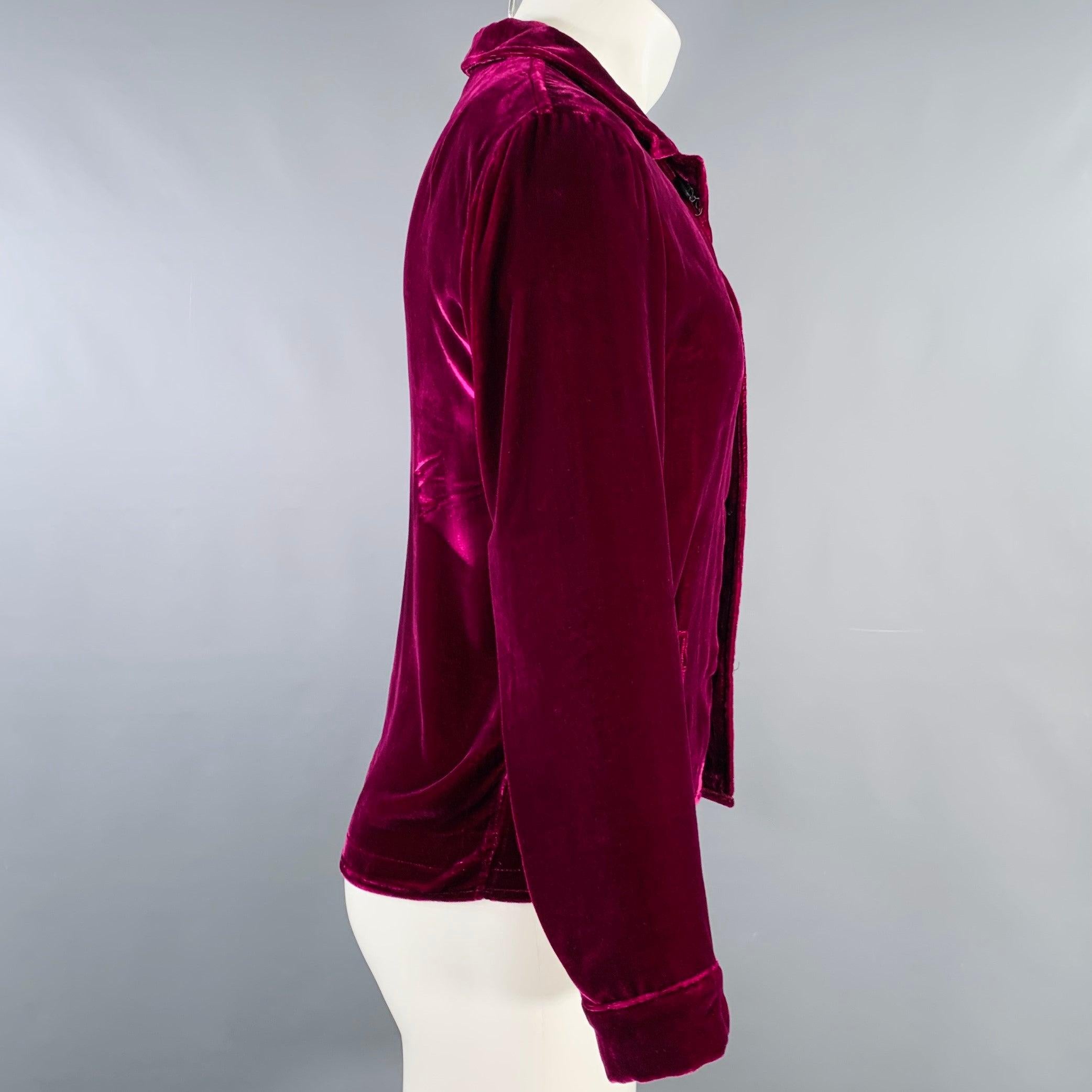 DRIES VAN NOTEN long sleeve shirt
in a fuchsia purple velvet featuring three patch pockets, and button closure with large buttons. Note: this garment has been altered, please double check measurements.Very Good Pre-Owned Condition. Signs of