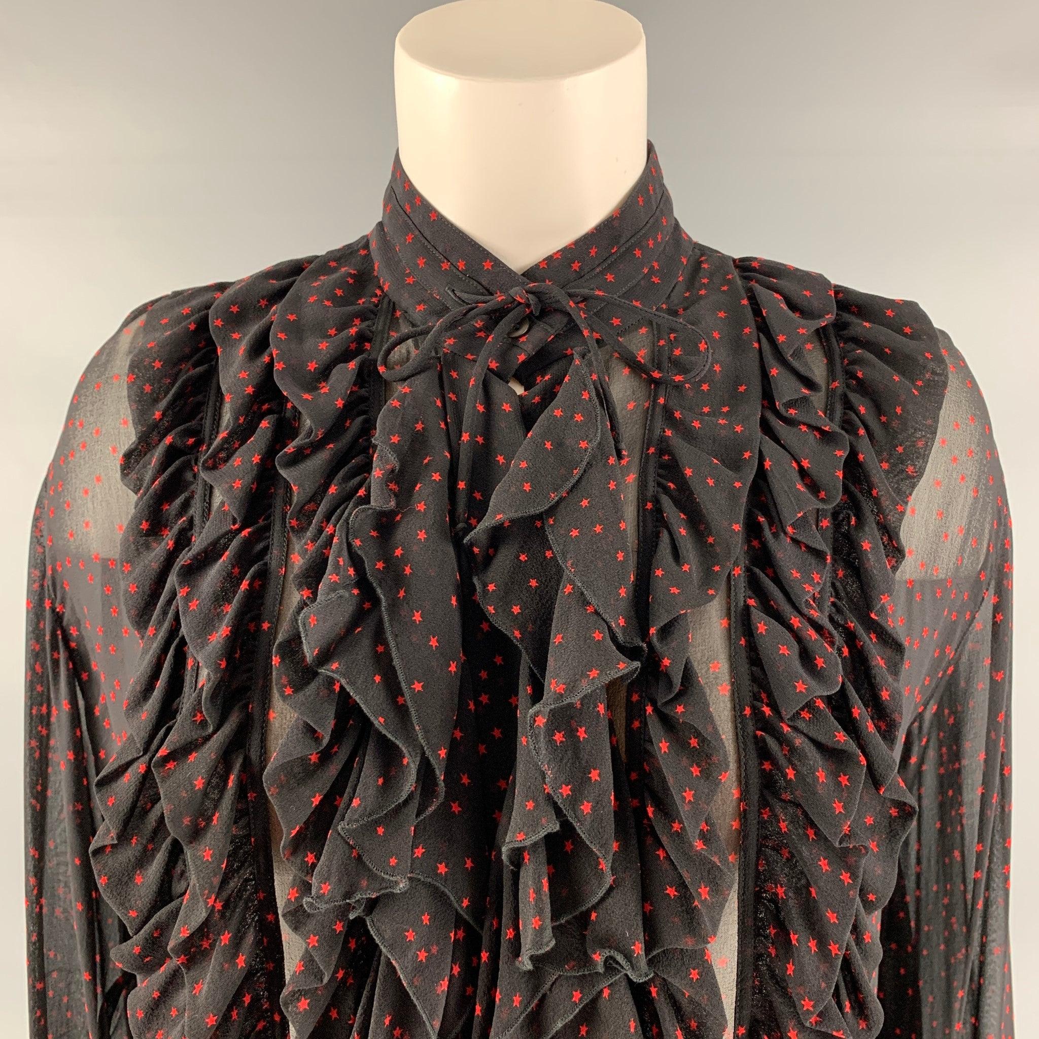 DRIES VAN NOTEN long sleeve shirt comes in a black and red star printed silk featuring ruffled details at front and sleeves, button down closure and tie at neckline. Excellent Pre-Owned Condition. 

Marked:   36 

Measurements: 
 
Shoulder: 20