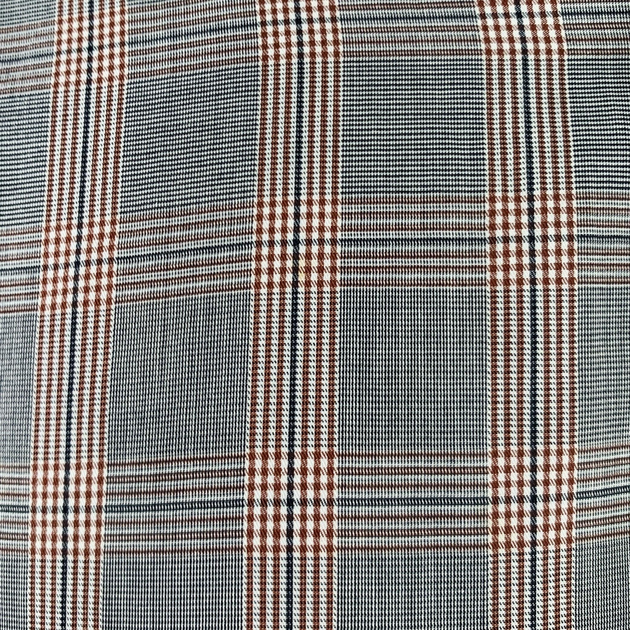 DRIES VAN NOTEN long sleeve shirt
in a grey and burgundy woven fabric featuring a glenplaid pattern, spread collar, and button closure.Excellent Pre-Owned Condition. 

Marked:   IT 50 

Measurements: 
 
Shoulder: 16.5 inches Chest: 40 inches Sleeve: