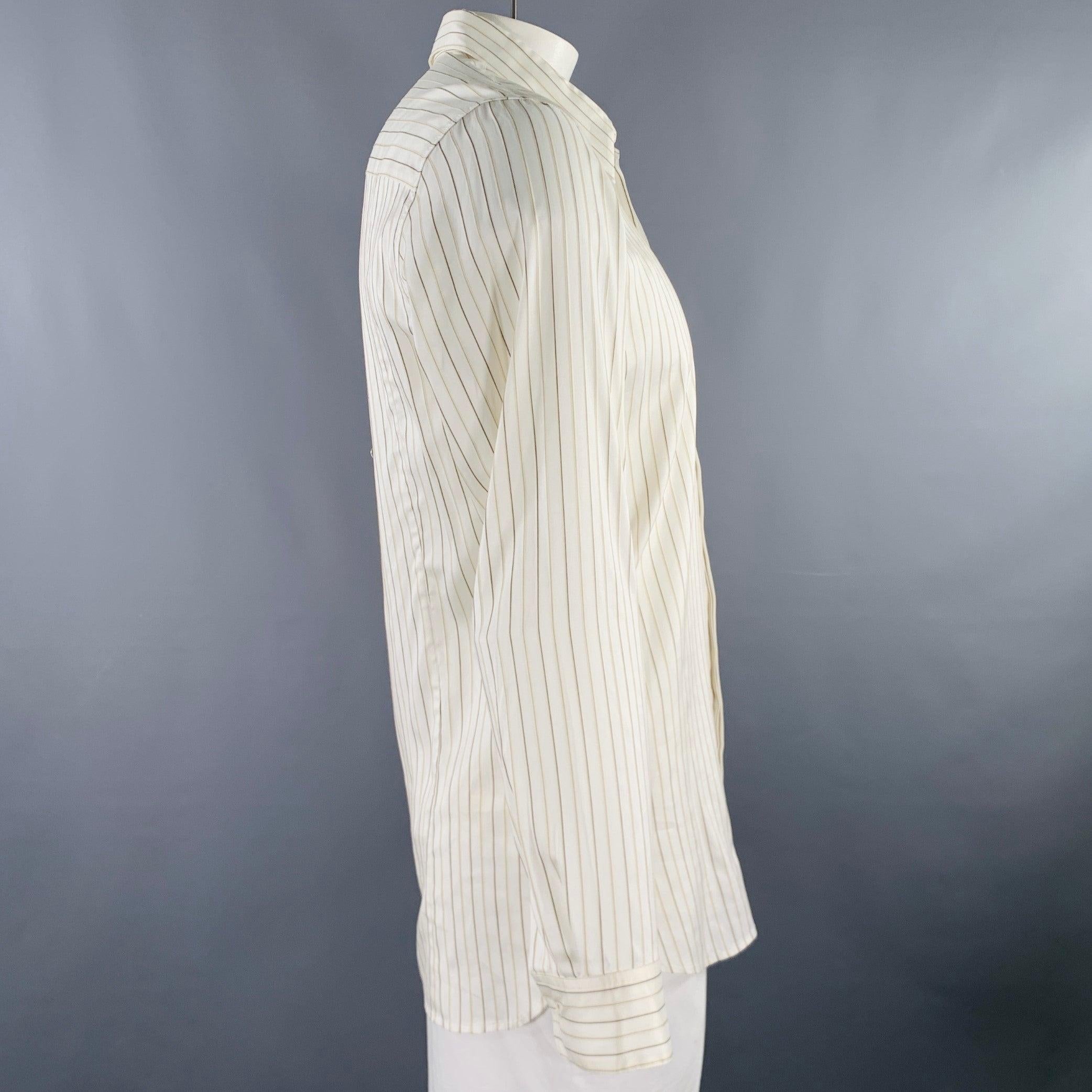 DRIES VAN NOTEN long sleeve shirt
in a cream and brown silk cotton woven blend featuring a stripe pattern, spread collar, and hidden button closure. Made in Hungary.Very Good Pre-Owned Condition. Minor mark inside of garment. 

Marked:   IT 52