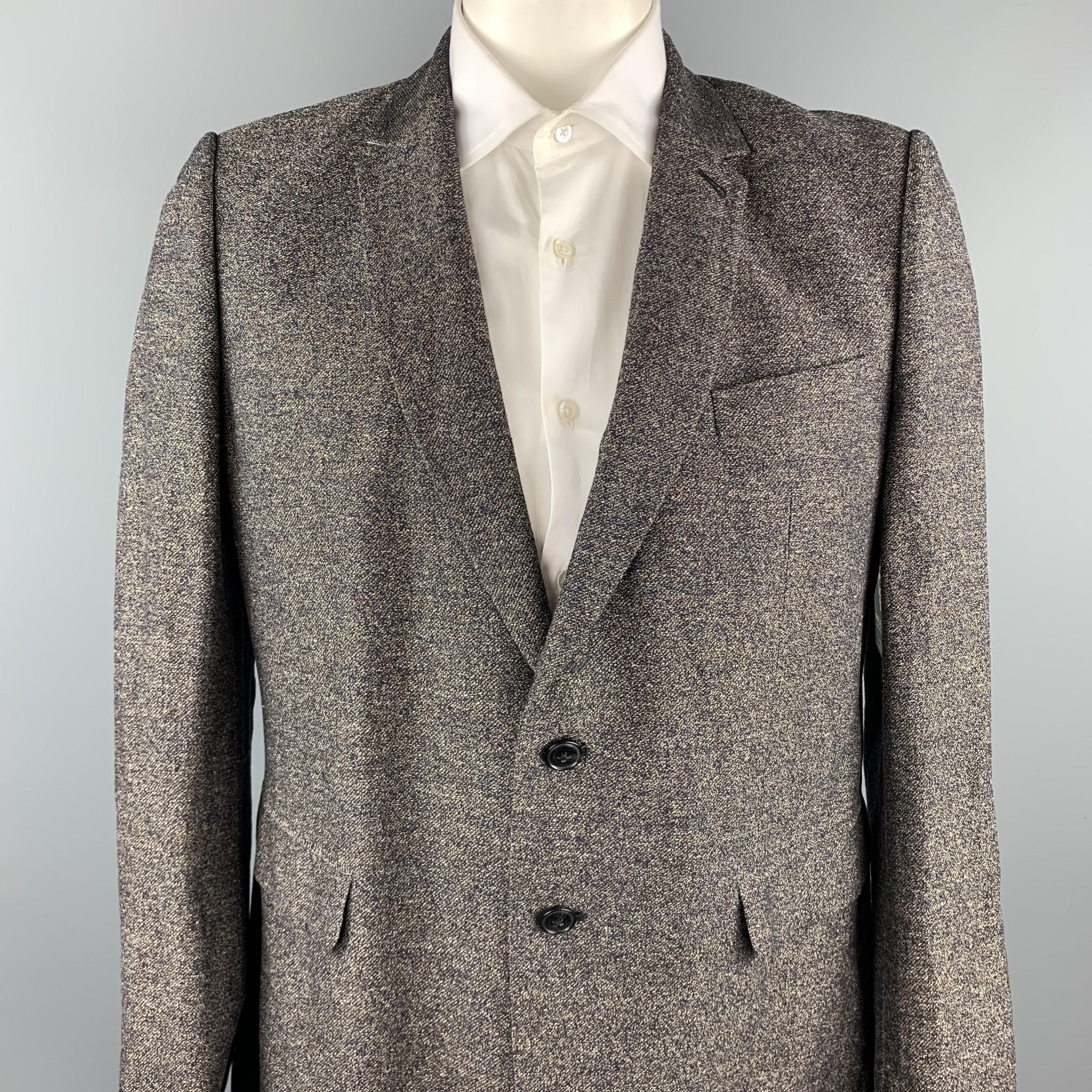 DRIES VAN NOTEN sport coat comes in a brown heather linen / cotton with a full liner featuring a notch lapel, flap pockets, and a two button closure. 

Excellent Pre-Owned Condition.
Marked: 54

Measurements:

Shoulder: 18 in. 
Chest: 44 in.