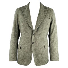 DRIES VAN NOTEN - Manteau de sport vert à chevrons en laine à revers en pointe, taille 44