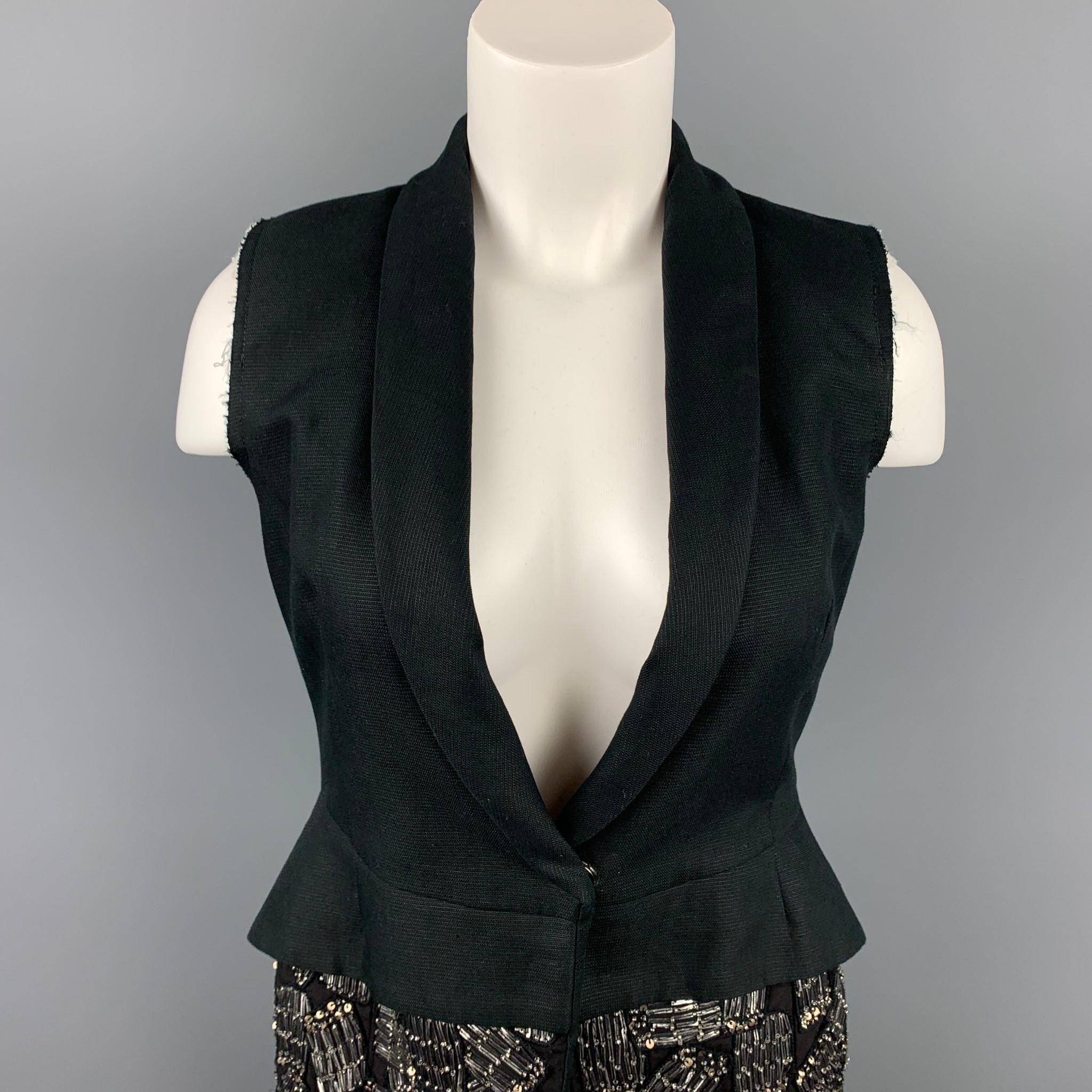 DRIES VAN NOTEN vest comes in a black cotton / linen with a beaded trim design featuring a full liner, shawl collar, and a single snap button closure. 

Very Good Pre-Owned Condition.
Marked: 36

Measurements:

Shoulder: 13 in.
Bust: 32 in.
Length: