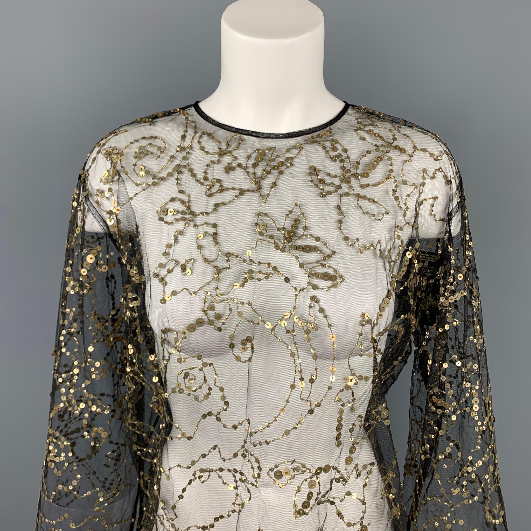 DRIES VAN NOTEN dress top comes in a black & gold beaded polyester featuring a crew-neck and a back button closure. 

New With Tags. 
Marked: 38
Original Retail Price: $850.00

Measurements:

Shoulder: 17.5 in.
Bust: 38 in.
Sleeve: 26.5 in.
Length: