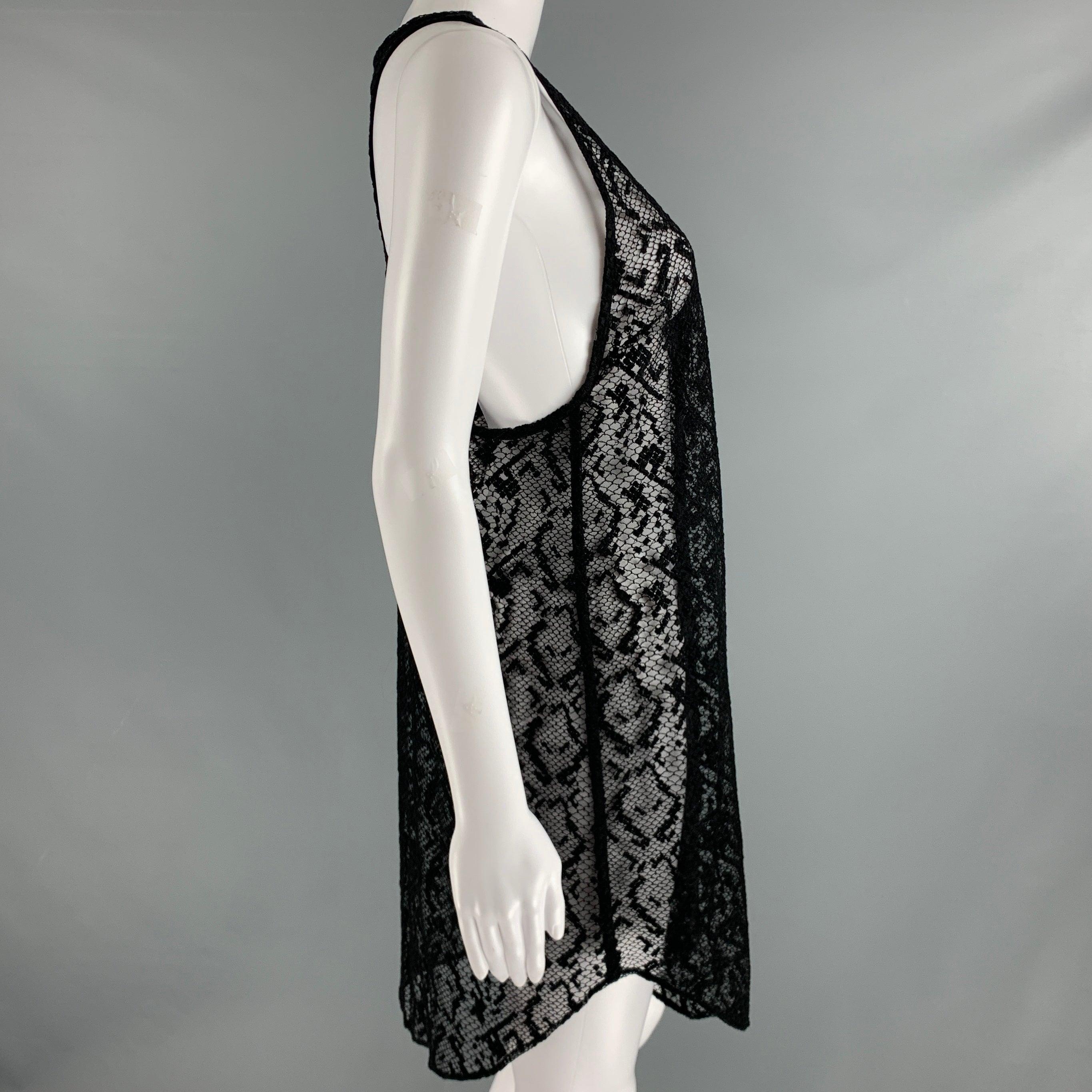 DRIES VAN NOTEN dress
in a black lace fabric featuring a tank style, see through look, and knee length.Excellent Pre-Owned Condition. 

Marked:   38 

Measurements: 
 
Shoulder: 10 inches Bust: 38 inches Length: 33 inches 
  
  
 
Reference No.: